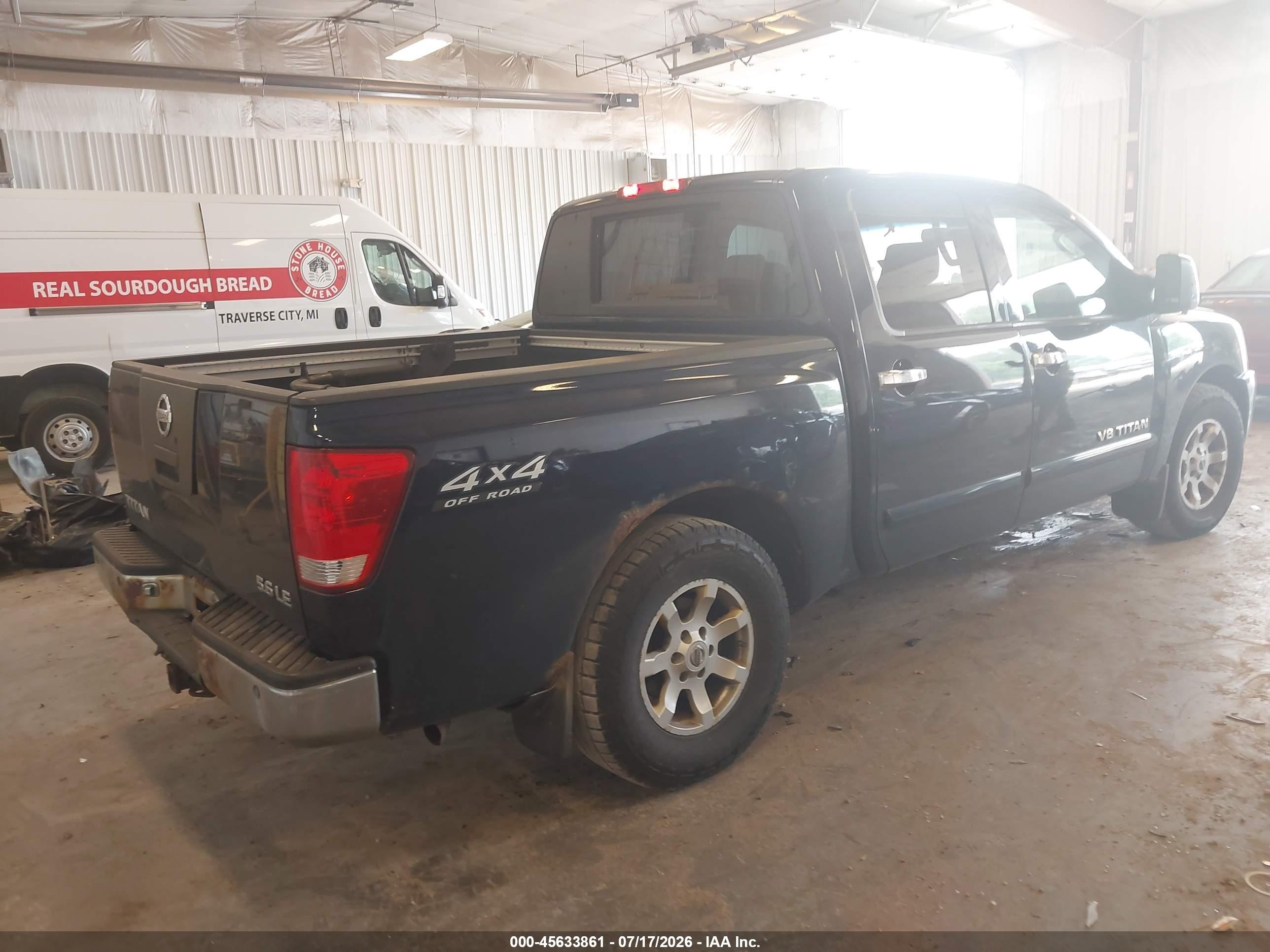 2006 Nissan Titan Le Blue vin: 1N6BA07B96N522017