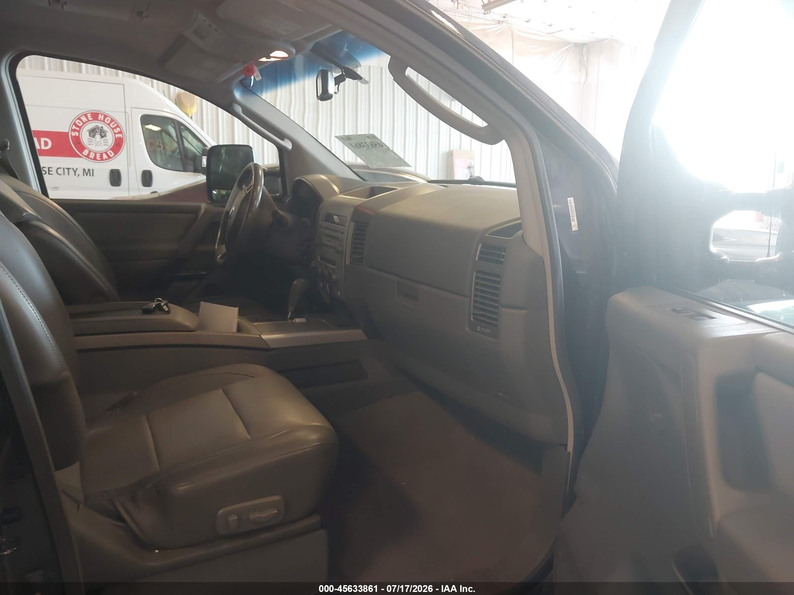 2006 Nissan Titan Le Blue vin: 1N6BA07B96N522017