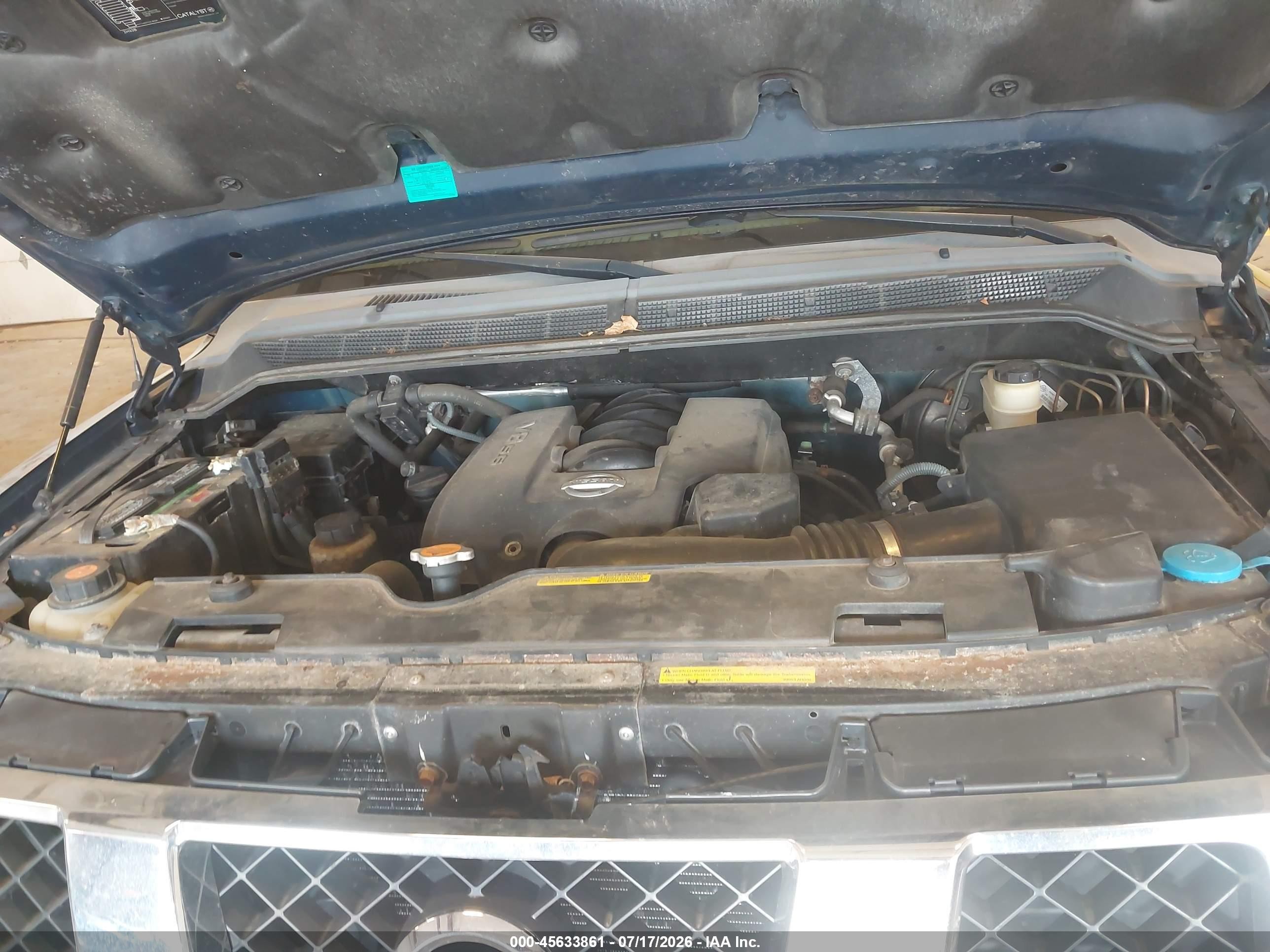 2006 Nissan Titan Le Blue vin: 1N6BA07B96N522017