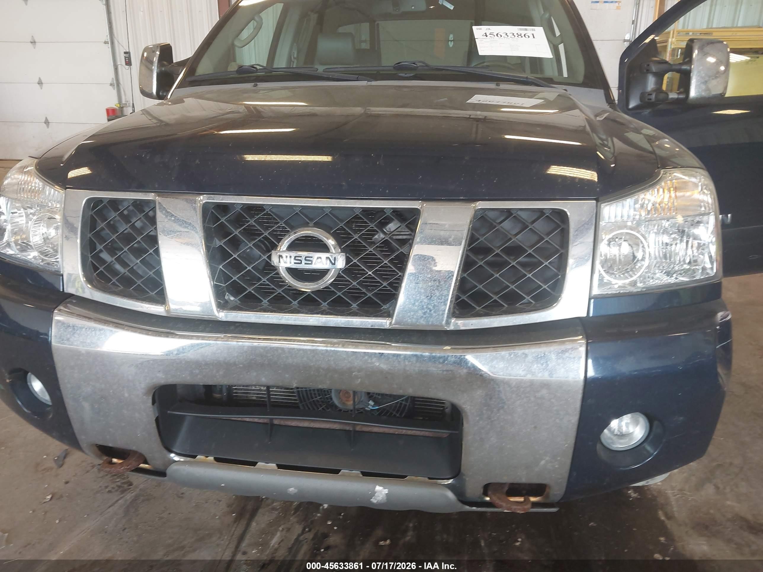 2006 Nissan Titan Le Blue vin: 1N6BA07B96N522017