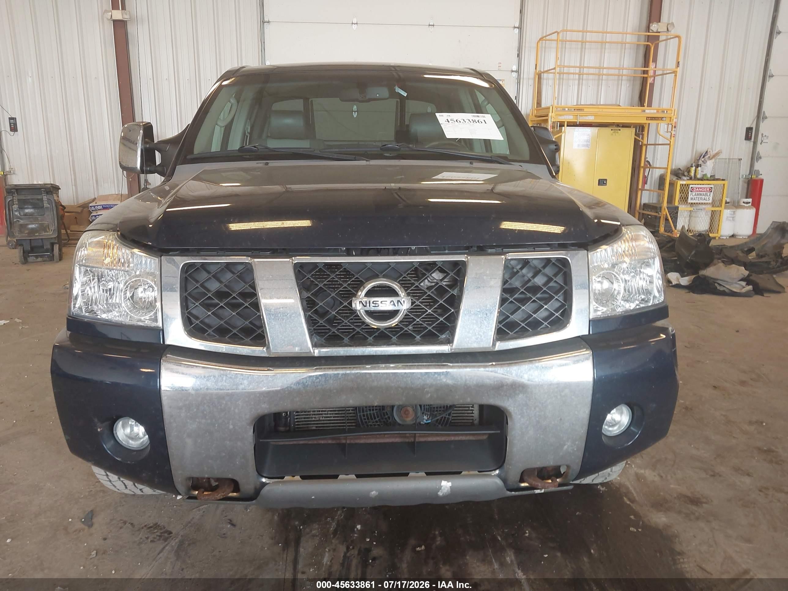 2006 Nissan Titan Le Blue vin: 1N6BA07B96N522017