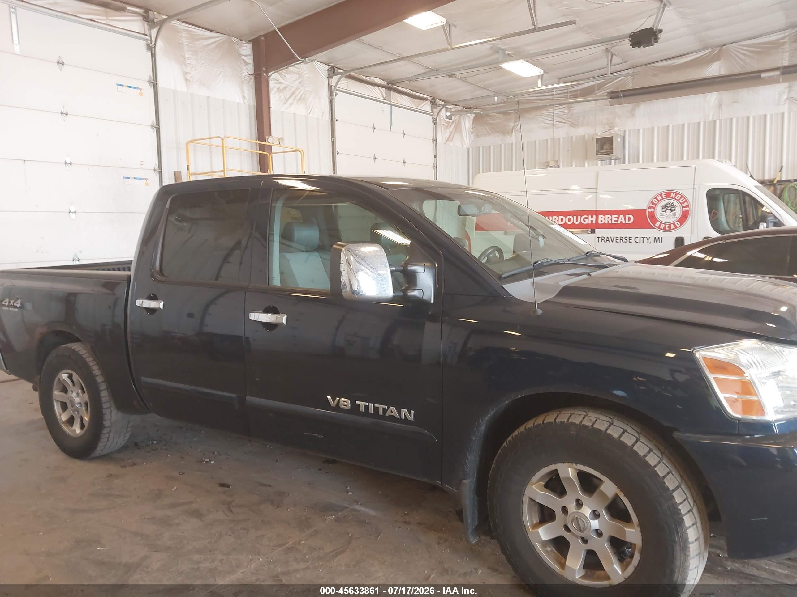 2006 Nissan Titan Le Blue vin: 1N6BA07B96N522017