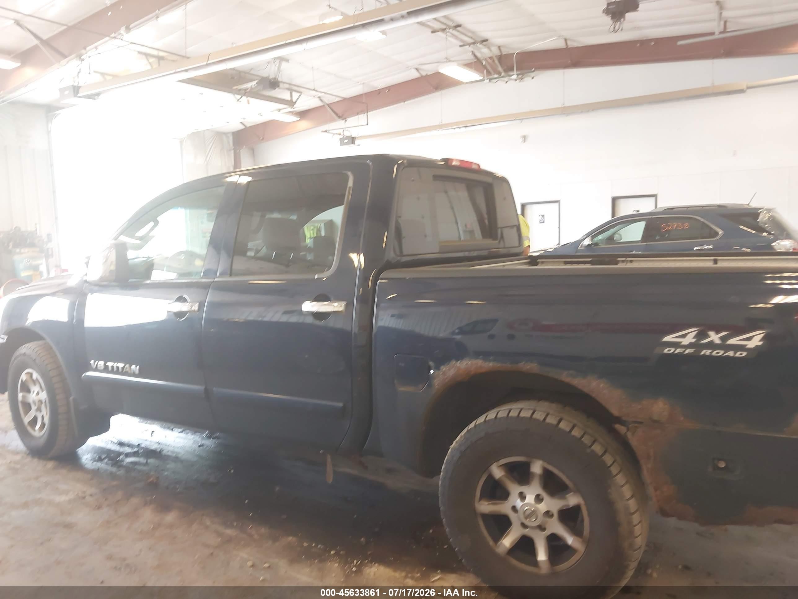 2006 Nissan Titan Le Blue vin: 1N6BA07B96N522017
