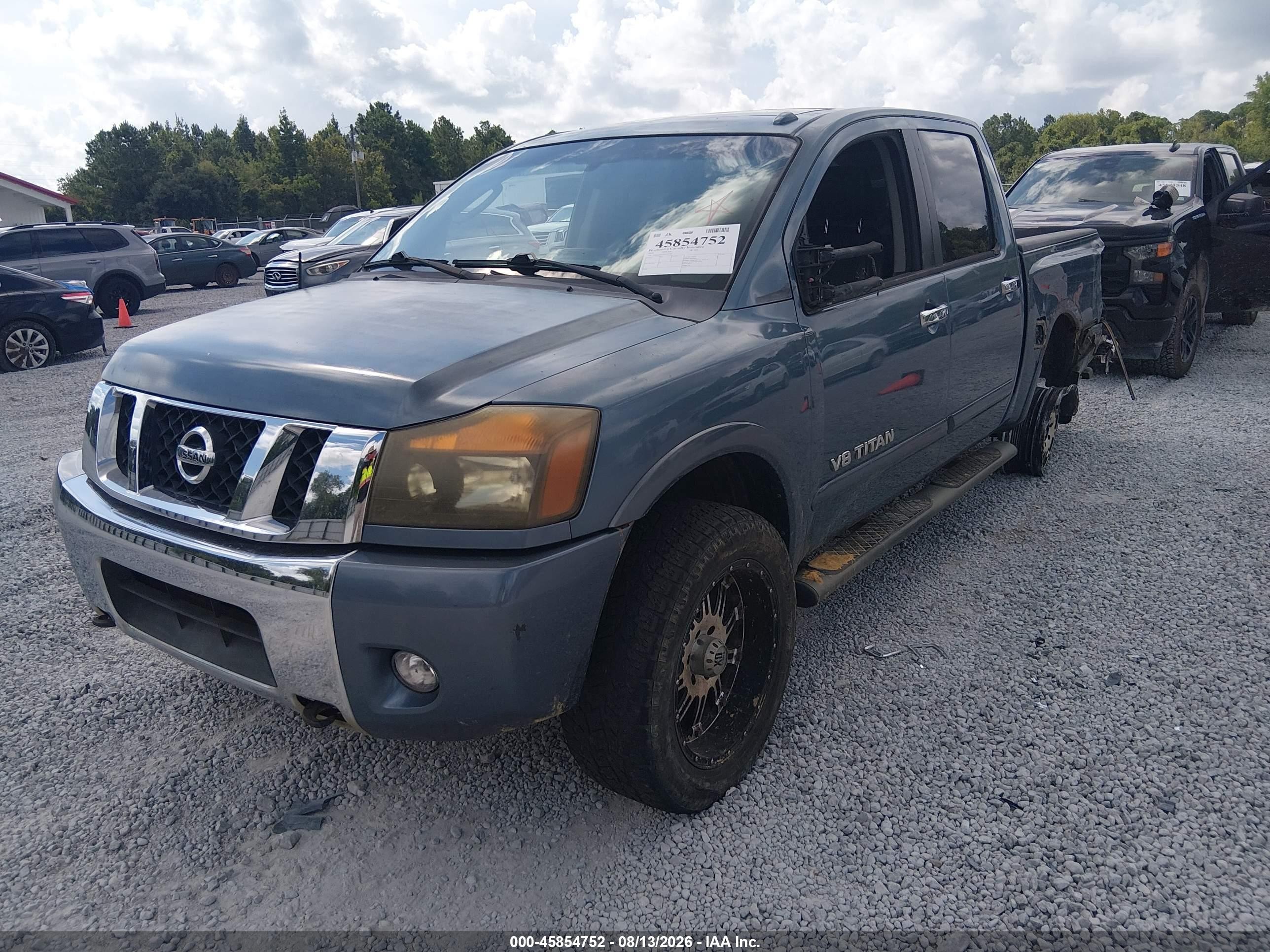 2010 Nissan Titan Le Синий vin: 1N6BA0ED9AN303880