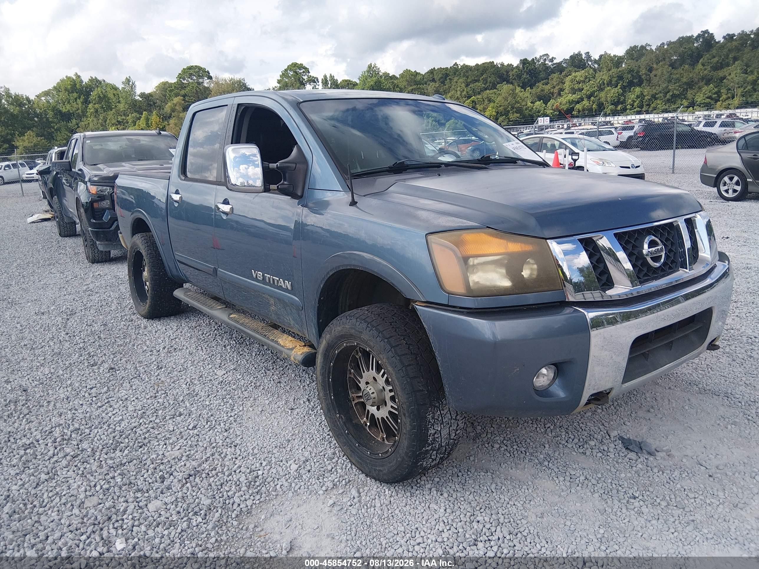 2010 Nissan Titan Le Синий vin: 1N6BA0ED9AN303880