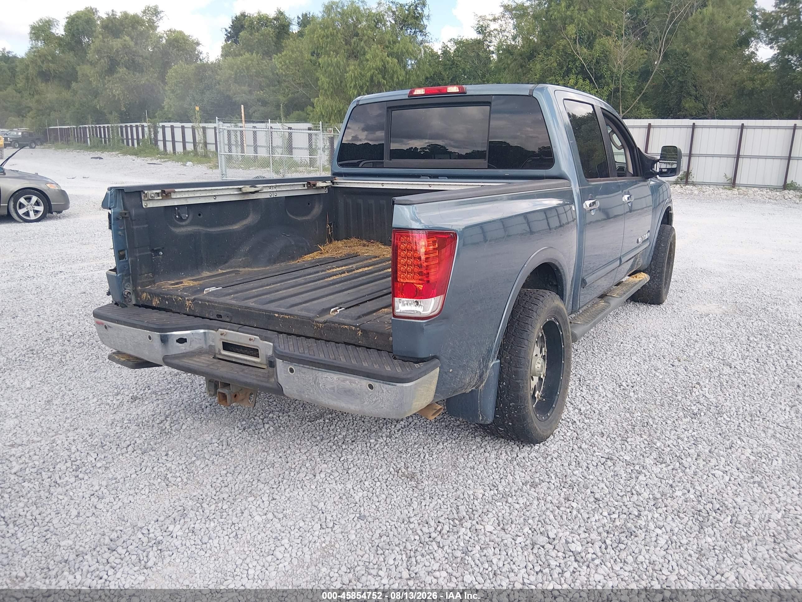 2010 Nissan Titan Le Синий vin: 1N6BA0ED9AN303880