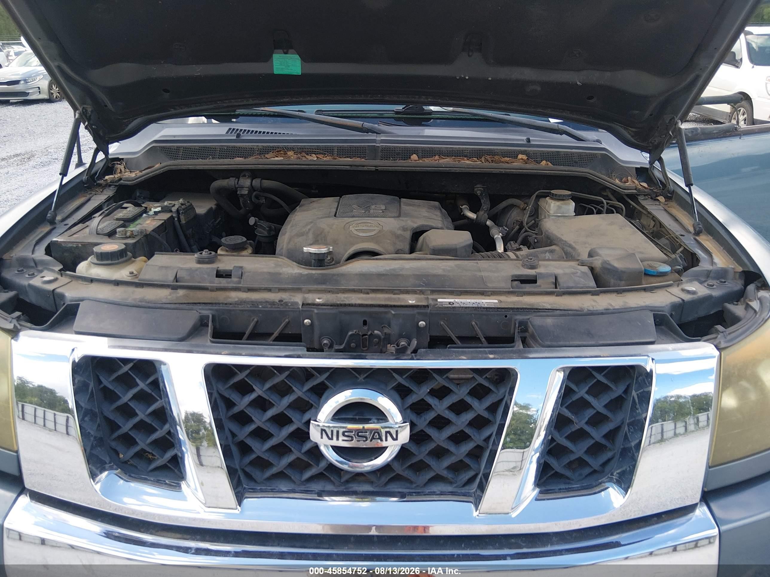 2010 Nissan Titan Le Синий vin: 1N6BA0ED9AN303880