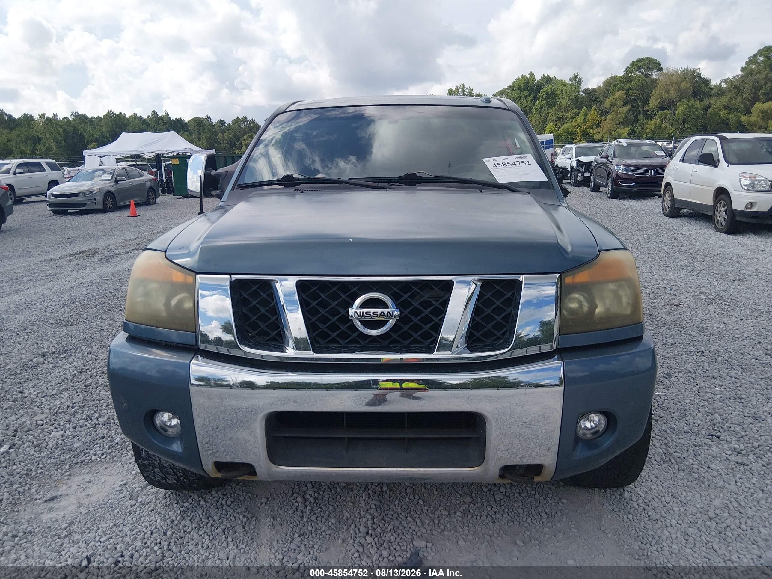 2010 Nissan Titan Le Синий vin: 1N6BA0ED9AN303880