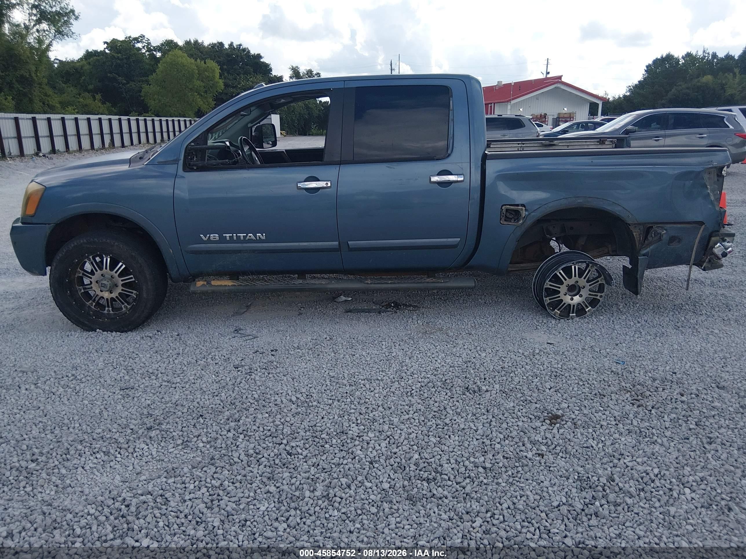 2010 Nissan Titan Le Синий vin: 1N6BA0ED9AN303880