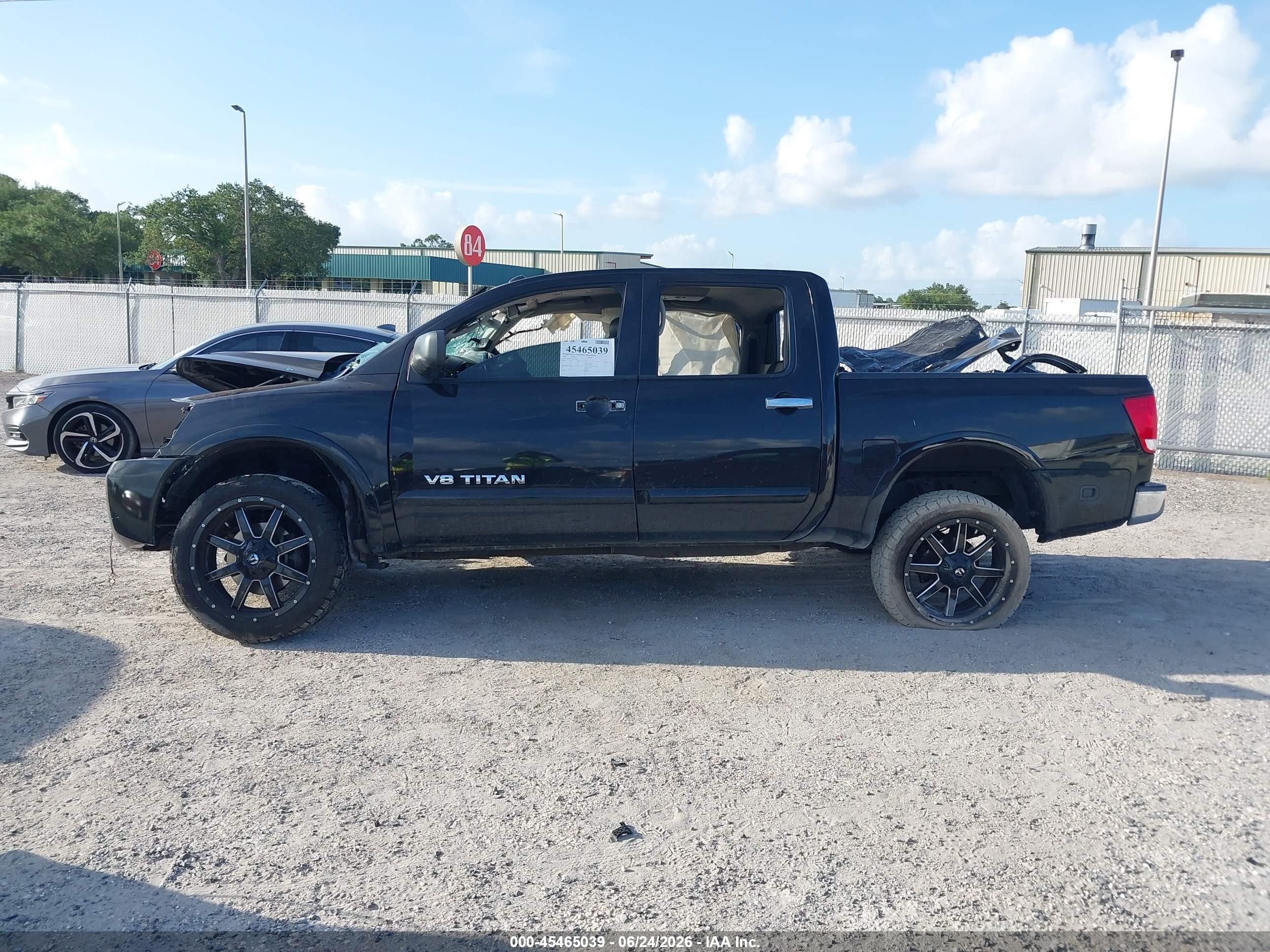 2010 Nissan Titan Le Black vin: 1N6BA0ED9AN322204