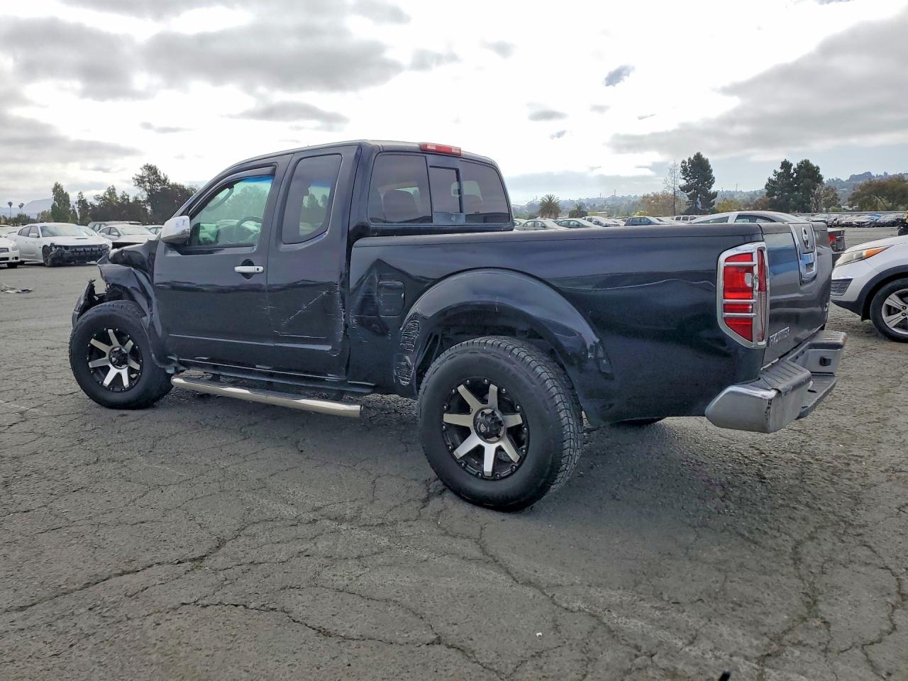 2007 Nissan Frontier Xe Black vin: 1N6BD06T27C465898