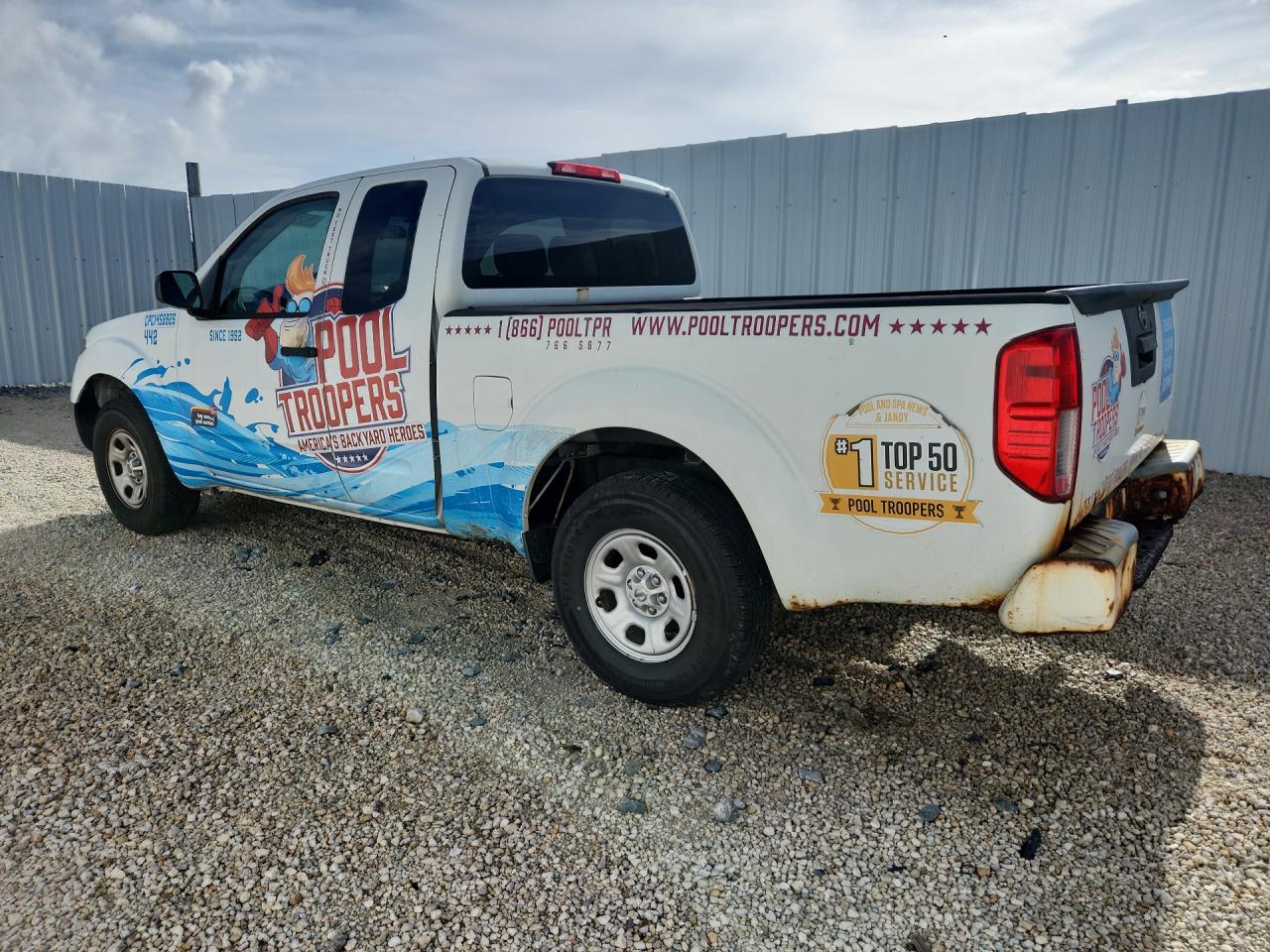 2019 Nissan Frontier S White vin: 1N6BD0CT6KN759807 Damage: Left Bed Side, Rust, > 12 Inches