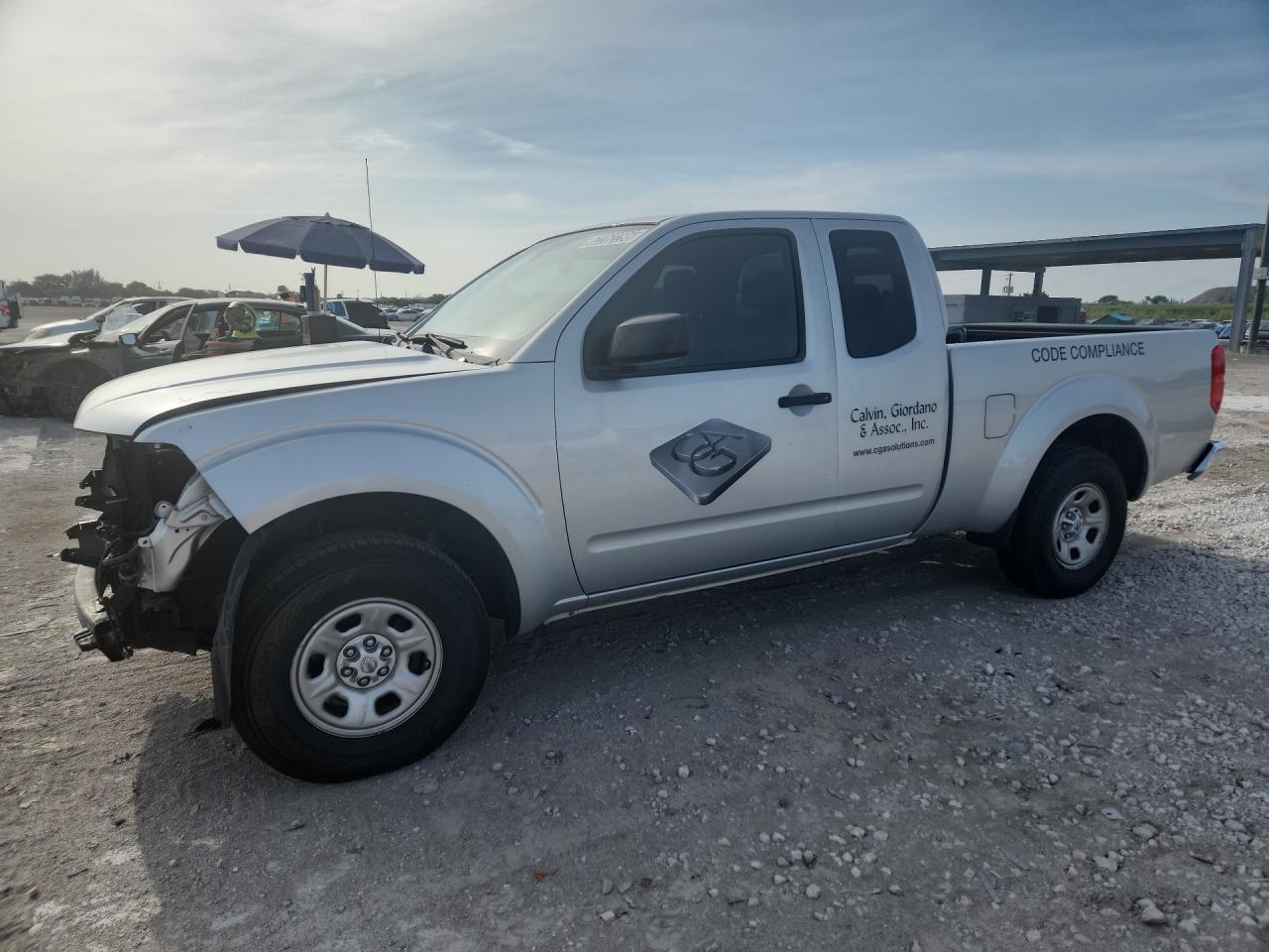 2015 Nissan Frontier S Silver vin: 1N6BD0CTXFN760397 Damage: Left Front Fender, Chipped, 4