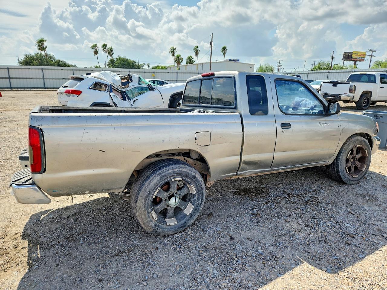 2000 Nissan Frontier King Cab Xe Brown vin: 1N6DD26S2YC358203