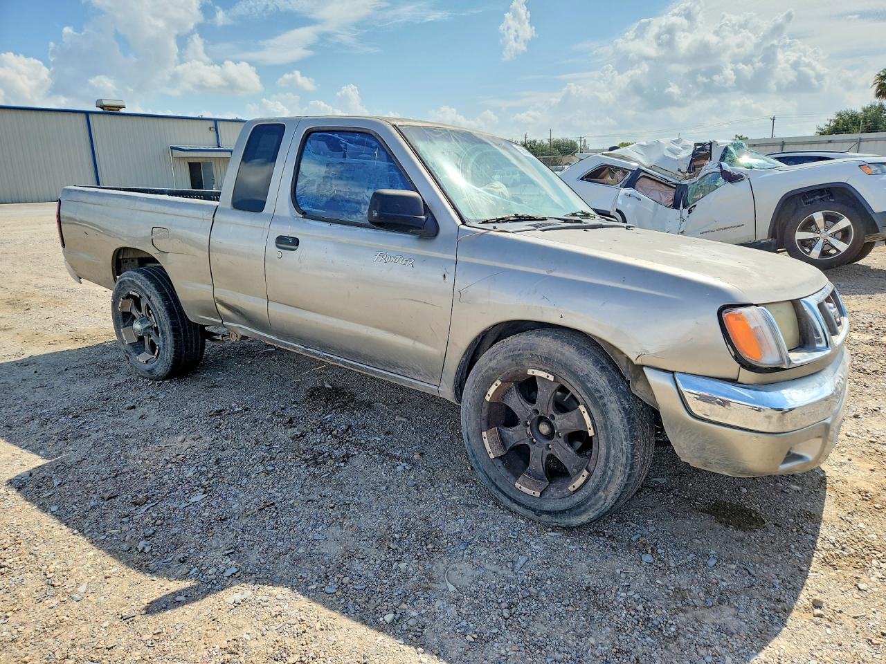 2000 Nissan Frontier King Cab Xe Brown vin: 1N6DD26S2YC358203