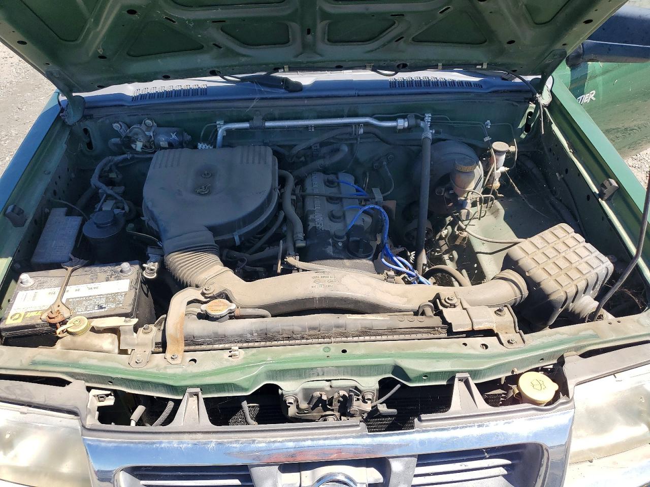 1998 Nissan Frontier Xe Green vin: 1N6DD26S3WC379106