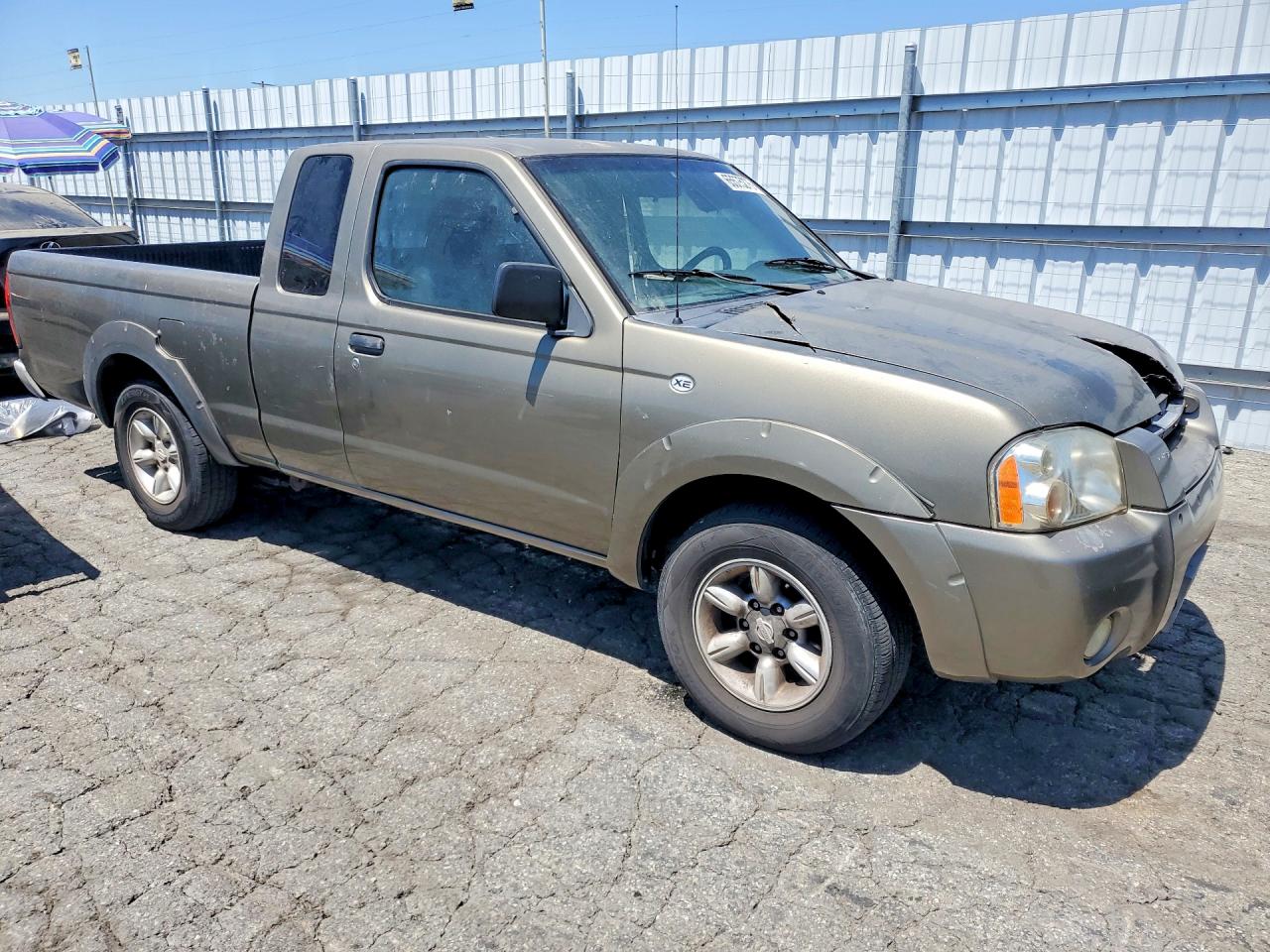 2002 Nissan Frontier Standard Tan vin: 1N6DD26S52C335733