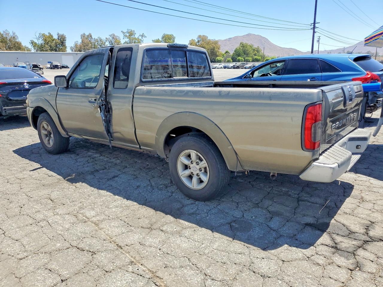 2002 Nissan Frontier Standard Tan vin: 1N6DD26S52C335733