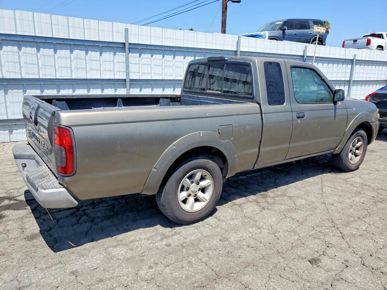 2002 Nissan Frontier Standard Tan vin: 1N6DD26S52C335733