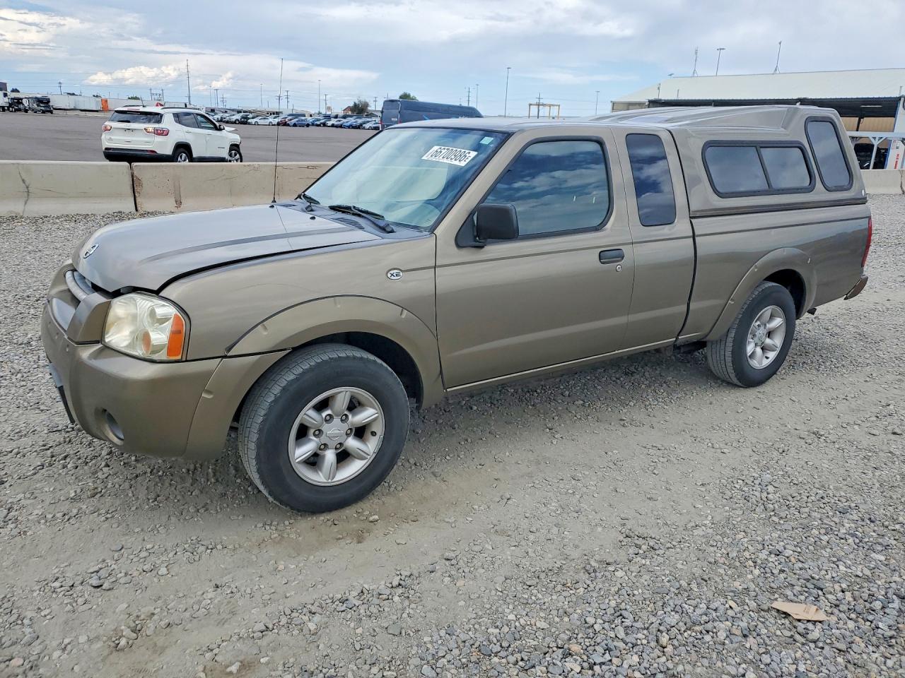2002 Nissan Frontier Standard Желто-коричневый vin: 1N6DD26S62C313806