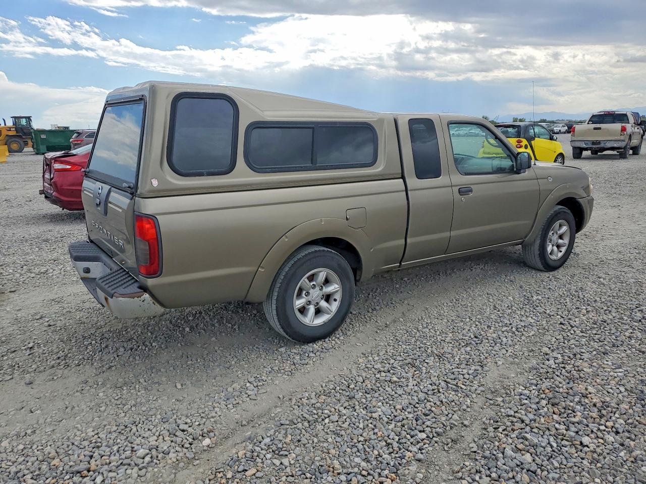 2002 Nissan Frontier Standard Желто-коричневый vin: 1N6DD26S62C313806