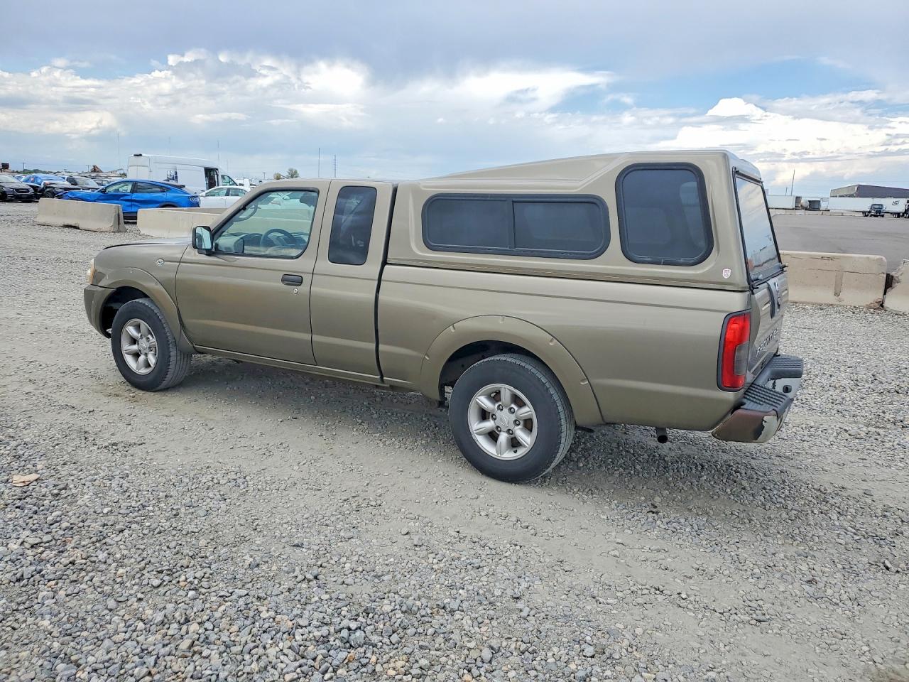 2002 Nissan Frontier Standard Желто-коричневый vin: 1N6DD26S62C313806