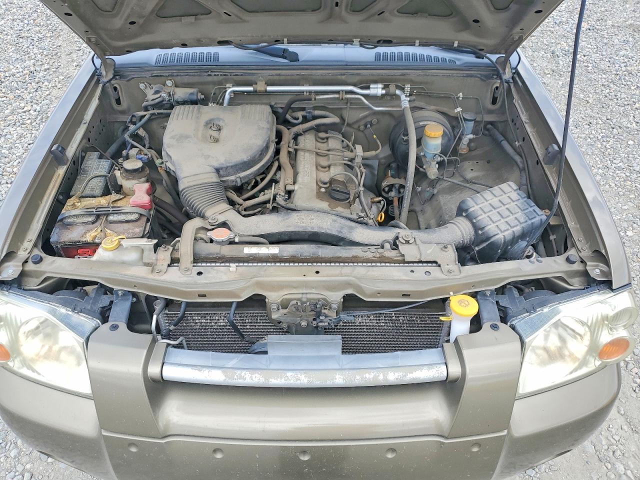 2002 Nissan Frontier Standard Желто-коричневый vin: 1N6DD26S62C313806