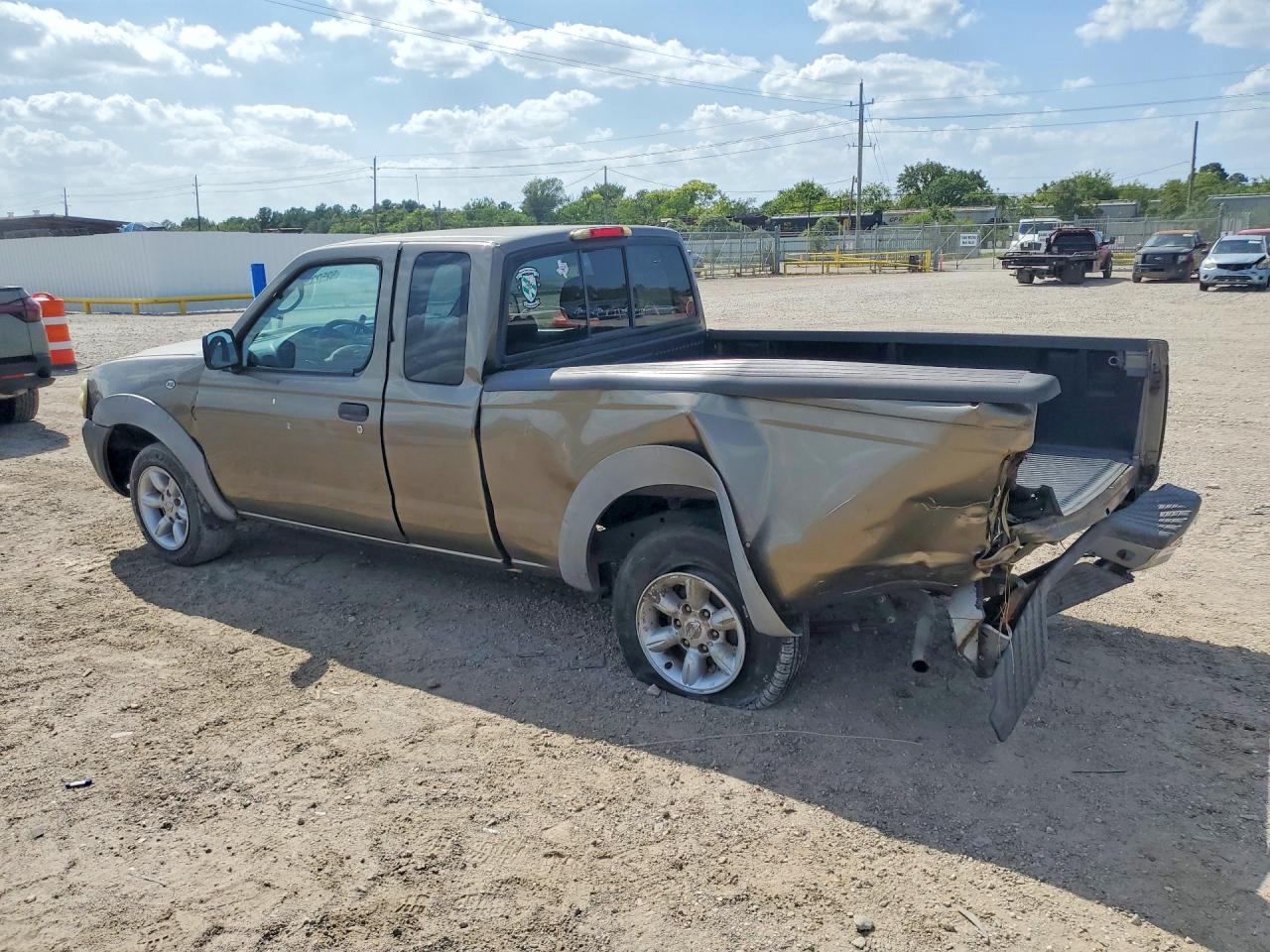 2002 Nissan Frontier King Cab Xe Желто-коричневый vin: 1N6DD26S82C366734