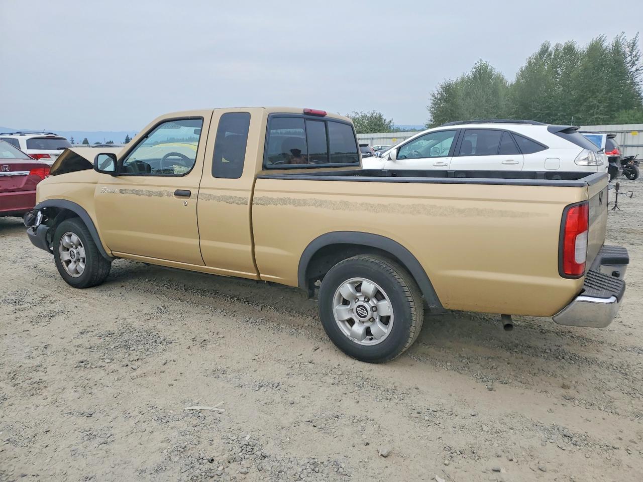 1998 Nissan Frontier Xe Gold vin: 1N6DD26SXWC300482