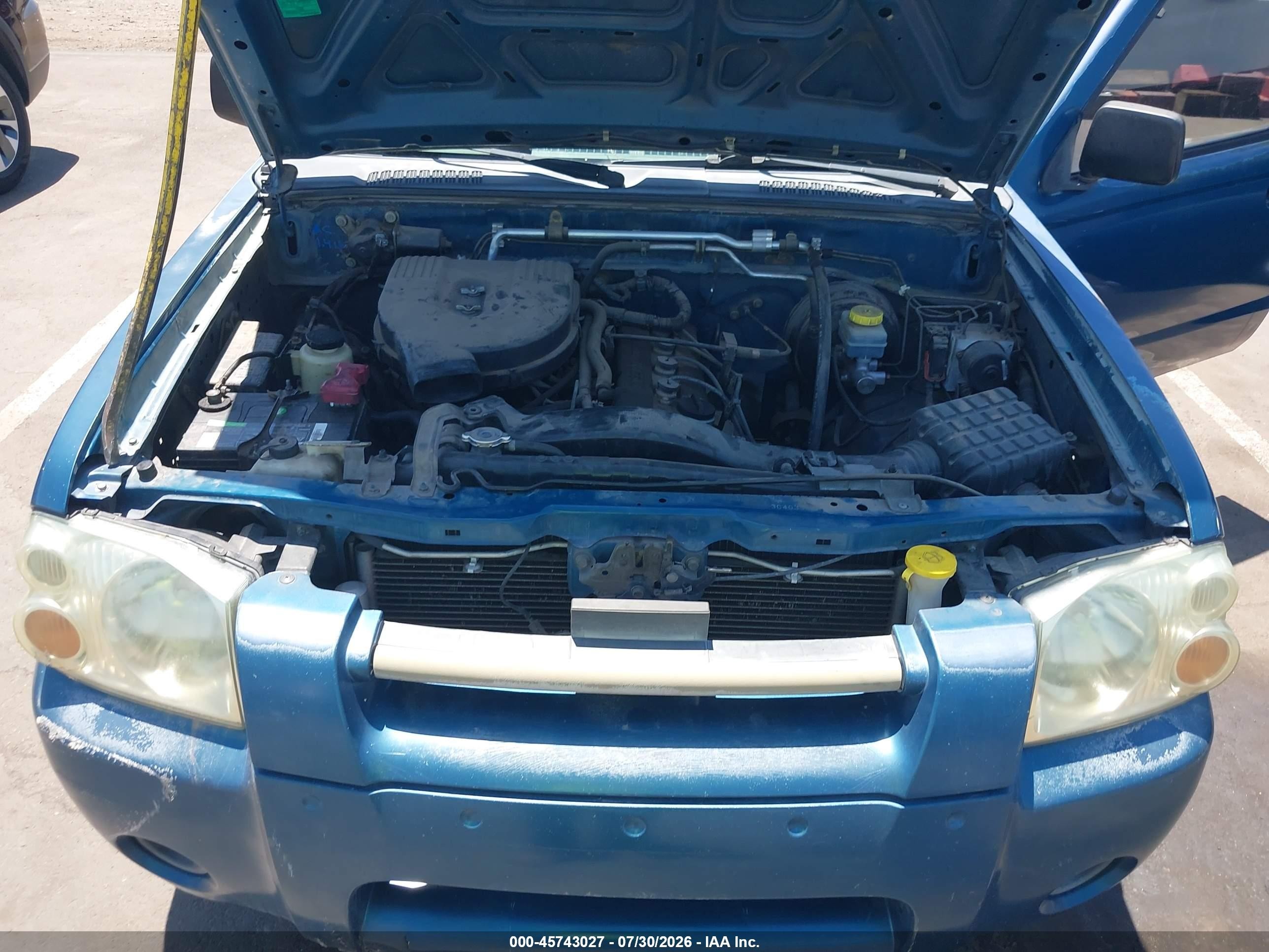 2003 Nissan Frontier Xe Teal vin: 1N6DD26T33C403988
