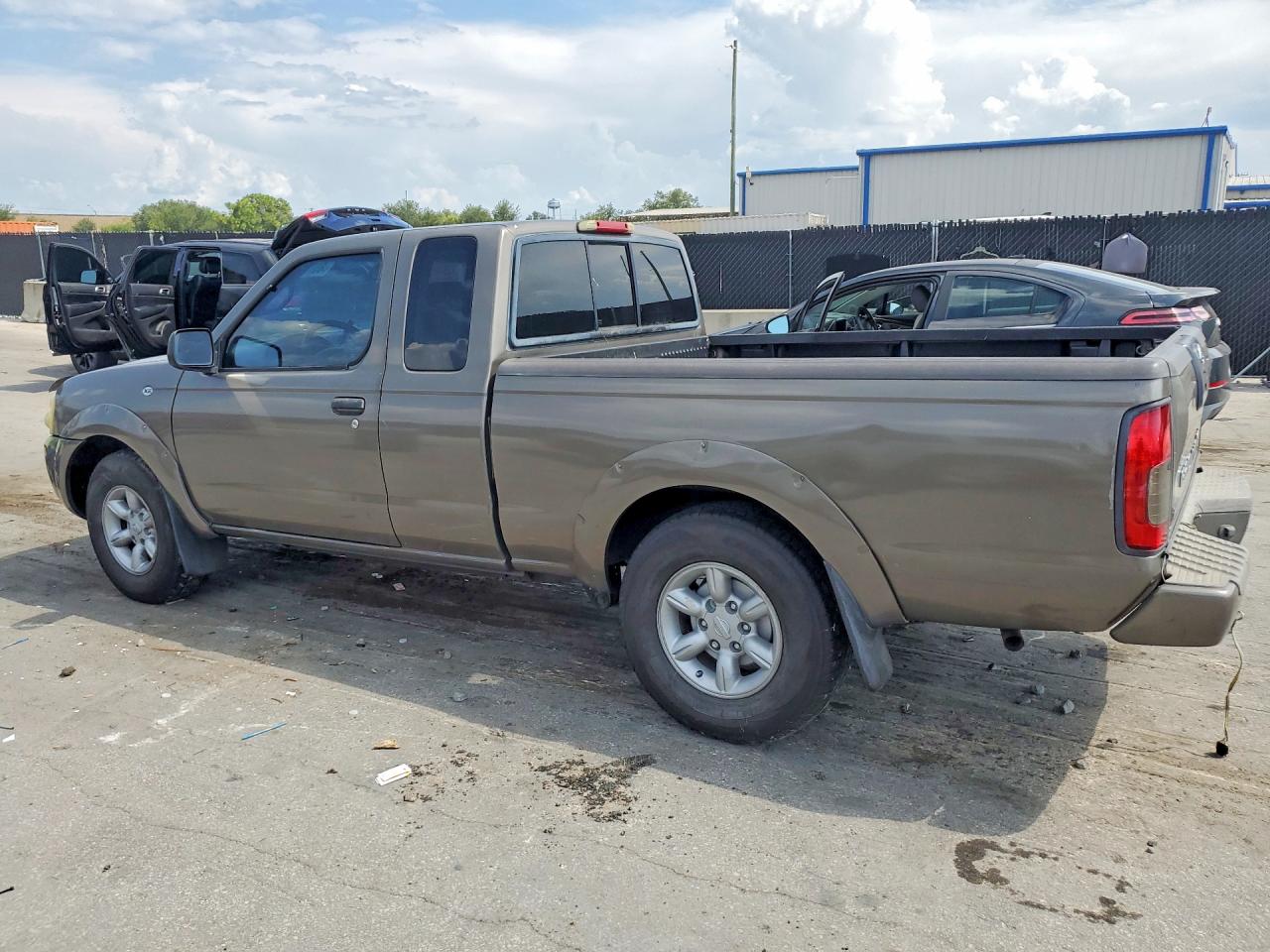 2004 Nissan Frontier Standard Tan vin: 1N6DD26T64C463510