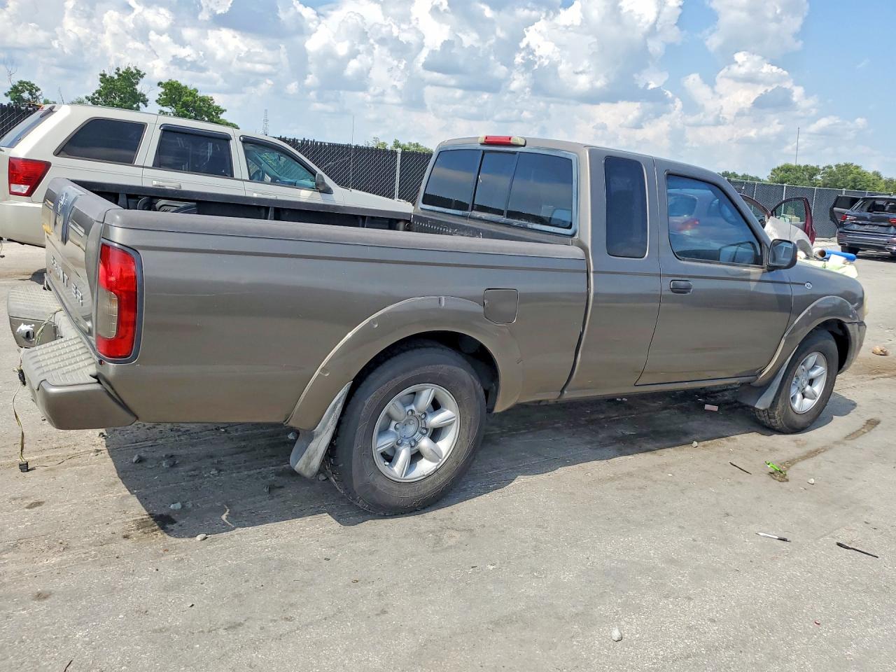 2004 Nissan Frontier Standard Tan vin: 1N6DD26T64C463510