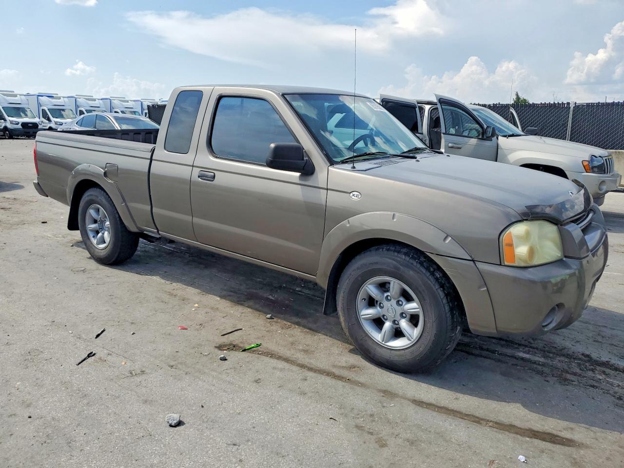 2004 Nissan Frontier Standard Tan vin: 1N6DD26T64C463510
