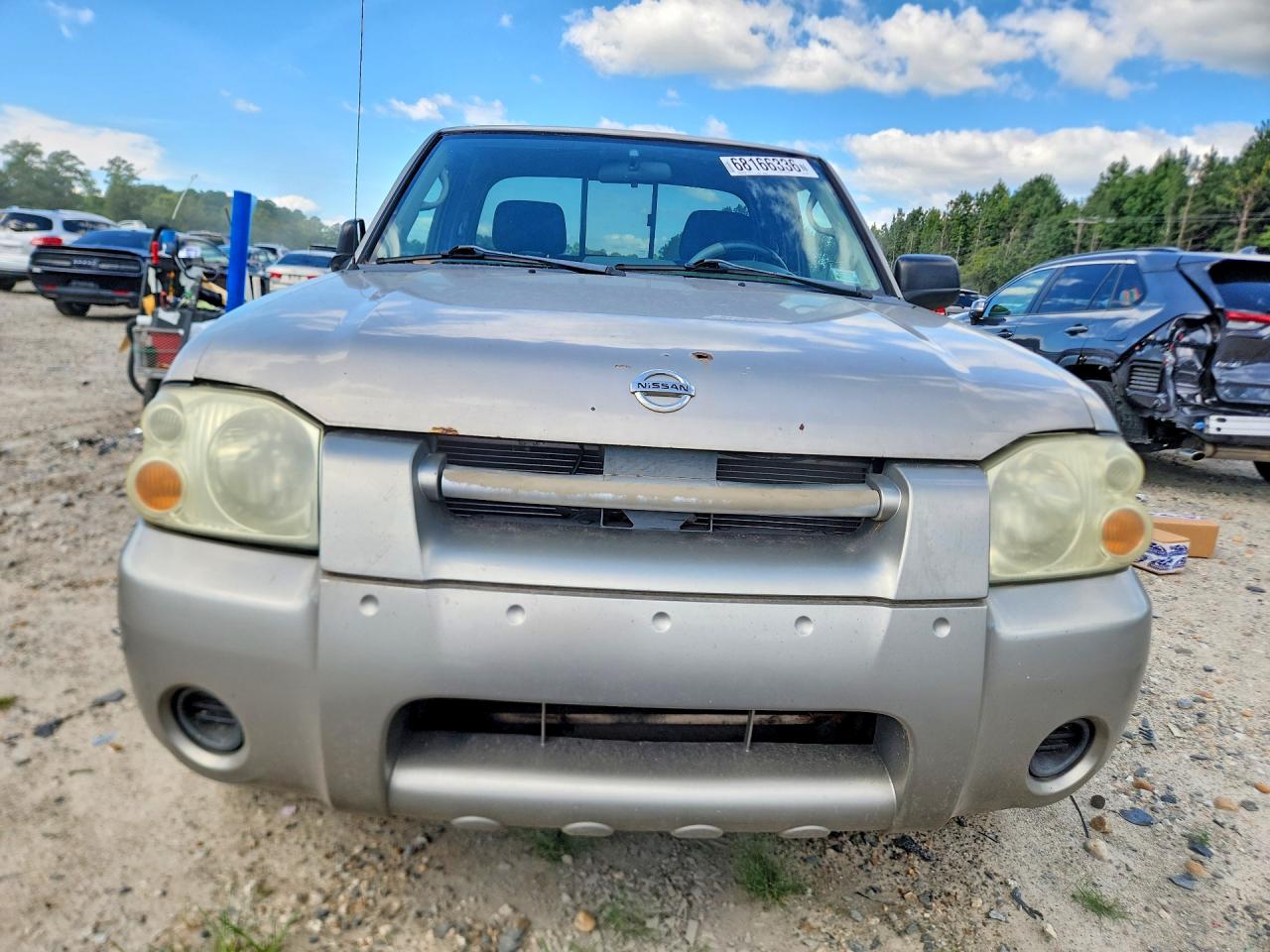 2004 Nissan Frontier Xe-v6 Tan vin: 1N6ED26Y34C433252