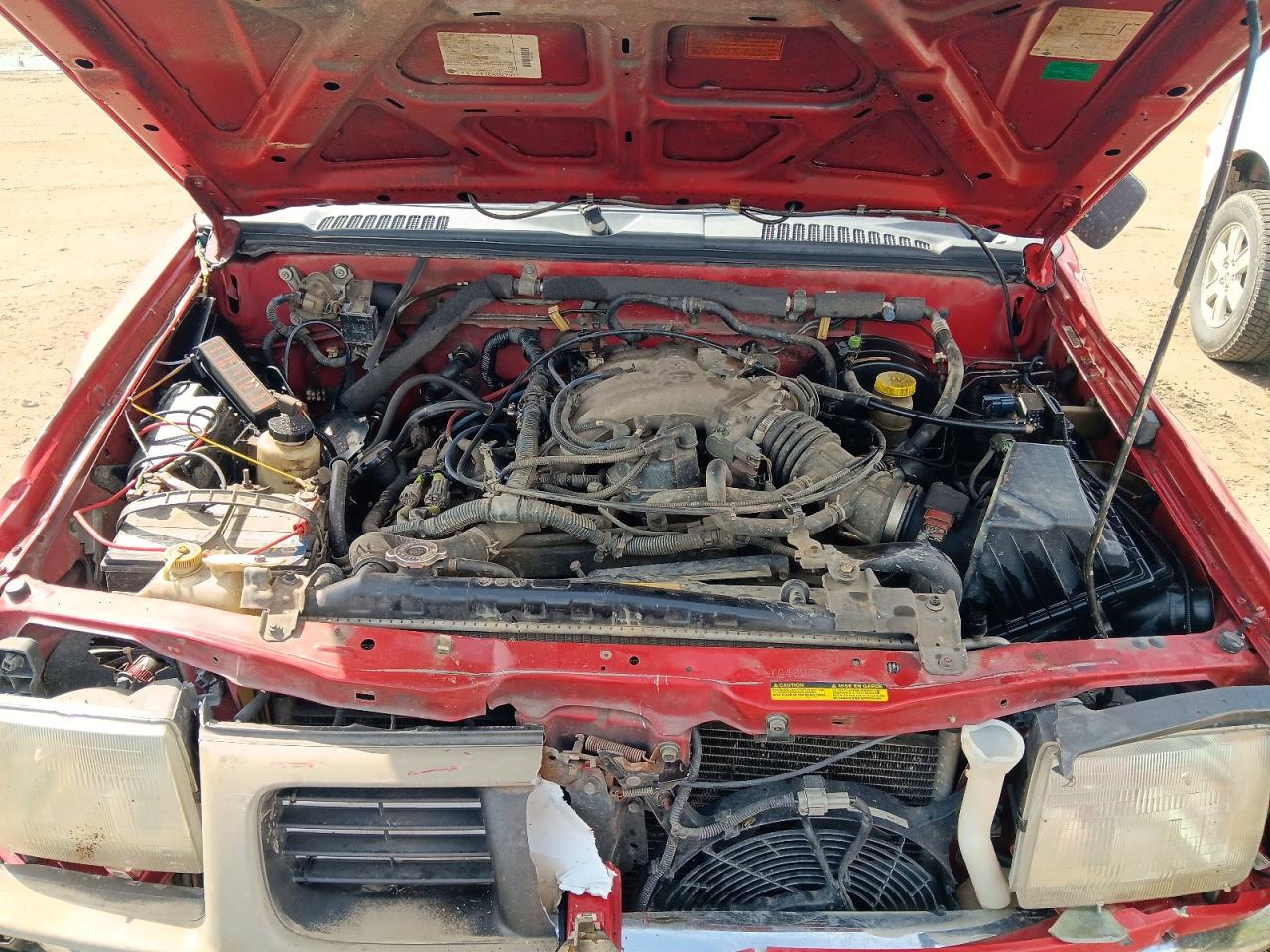 2000 Nissan Frontier Xe-v6 Red vin: 1N6ED26Y6YC429573