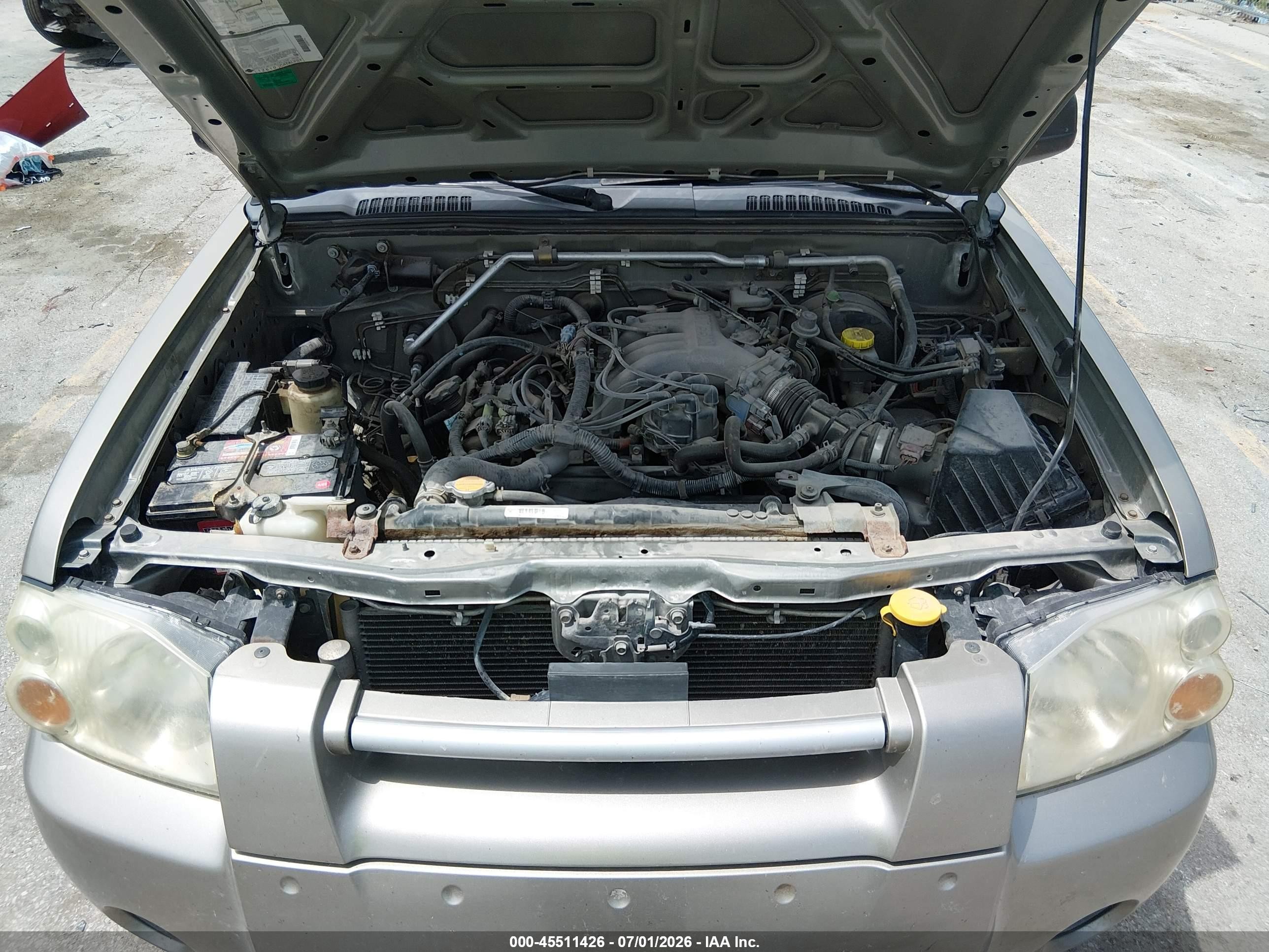 2003 Nissan Frontier Xe-v6 Burgundy vin: 1N6ED26YX3C424756