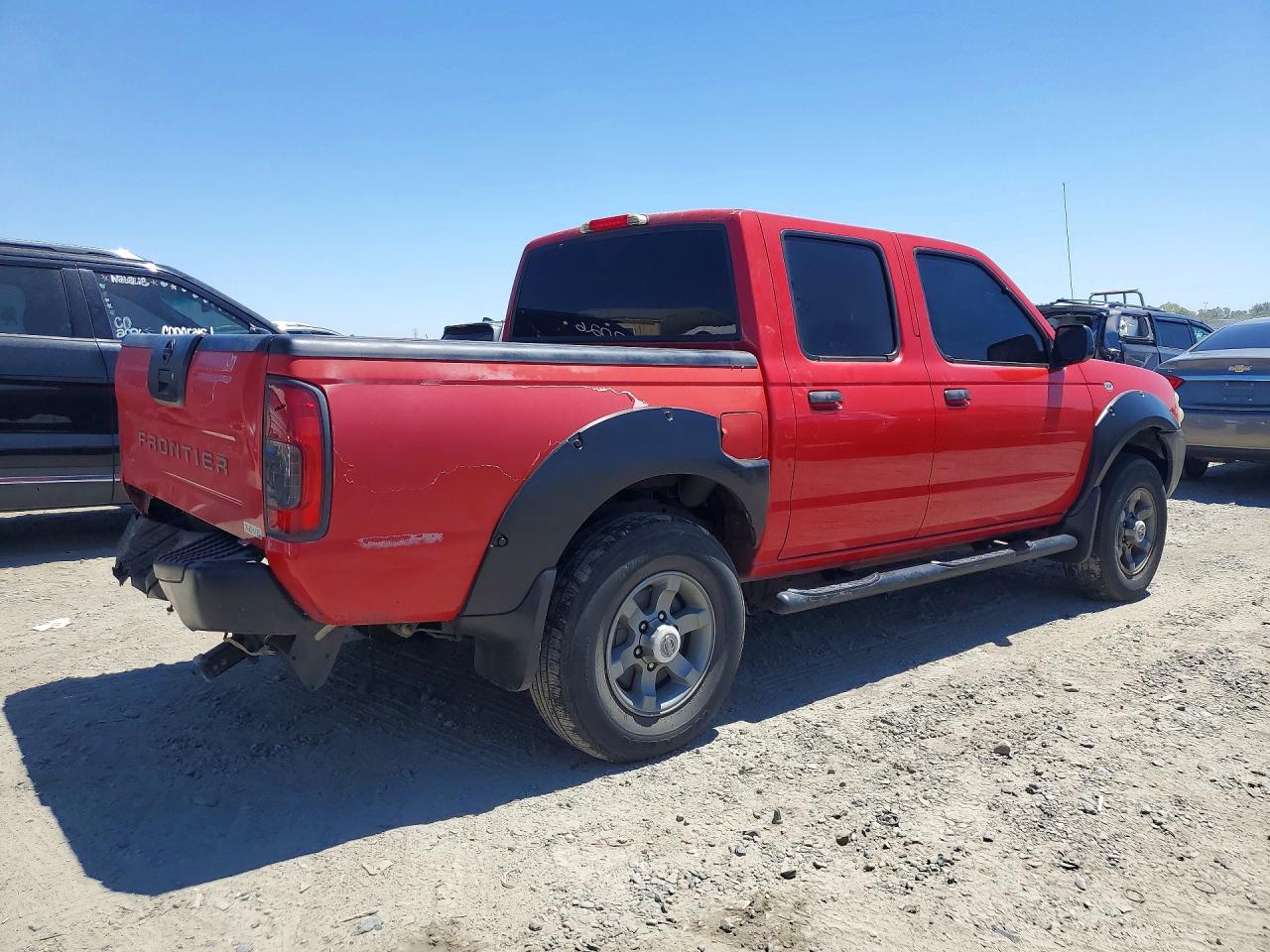 2003 Nissan Frontier Xe-v6 Красный vin: 1N6ED27T23C427833