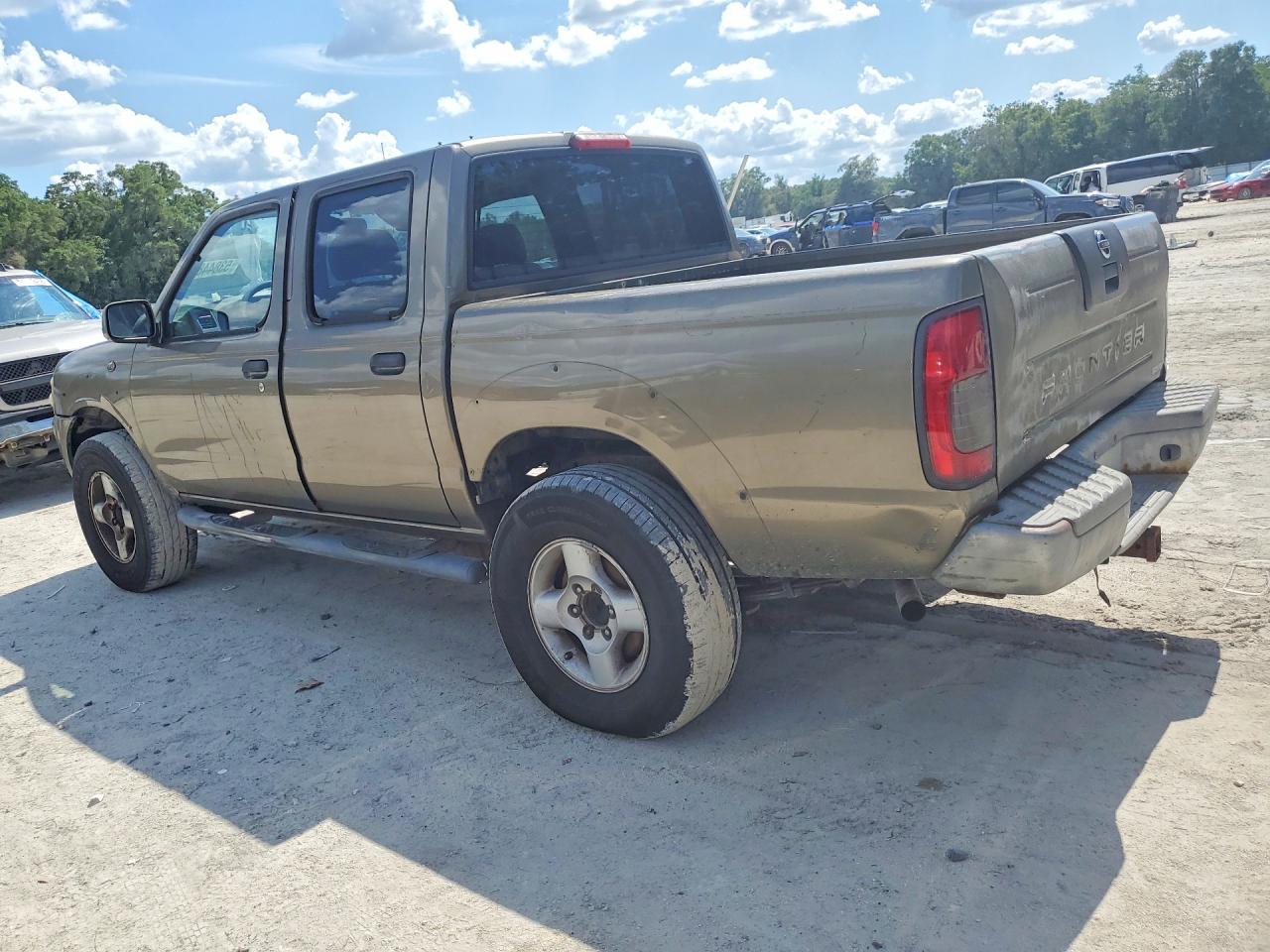 2001 Nissan Frontier Xe Gold vin: 1N6ED27T31C377537