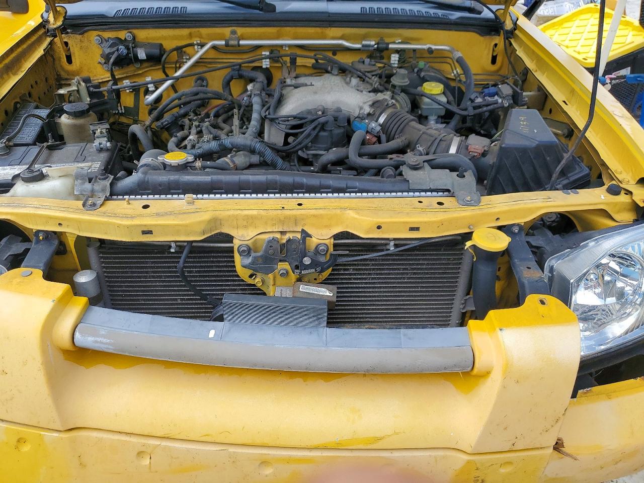2004 Nissan Frontier Xe-v6 Yellow vin: 1N6ED27T74C442605