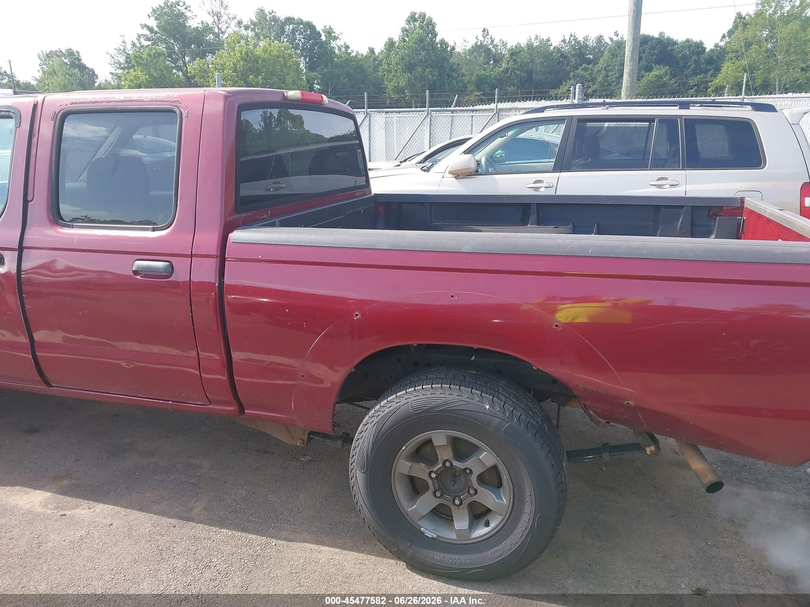2004 Nissan Frontier Xe-v6 Burgundy vin: 1N6ED29X44C402238
