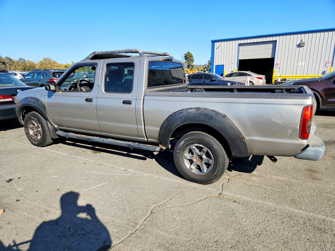 2002 Nissan Frontier Xe-v6 Tan vin: 1N6ED29X62C382670