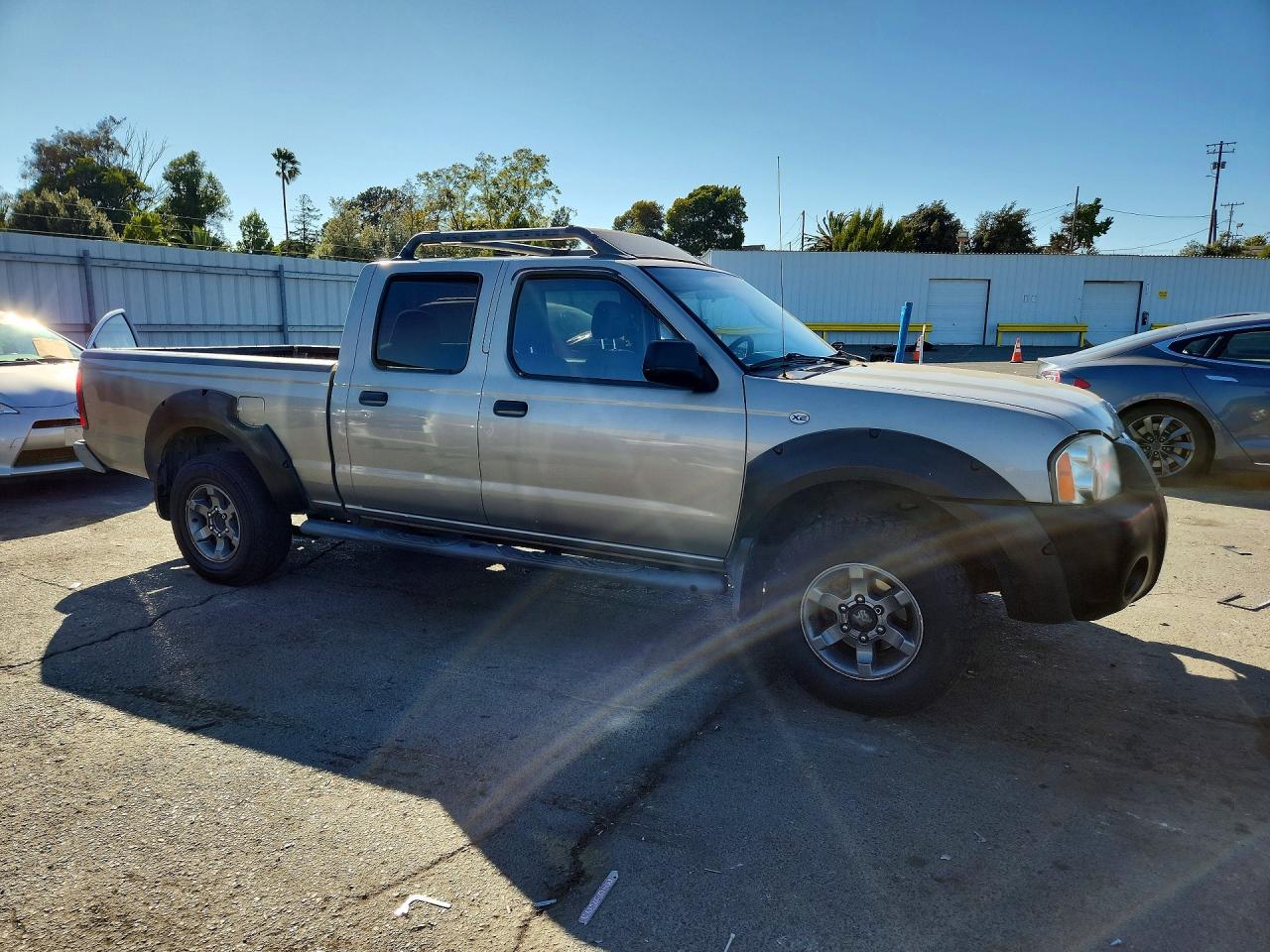 2002 Nissan Frontier Xe-v6 Tan vin: 1N6ED29X62C382670