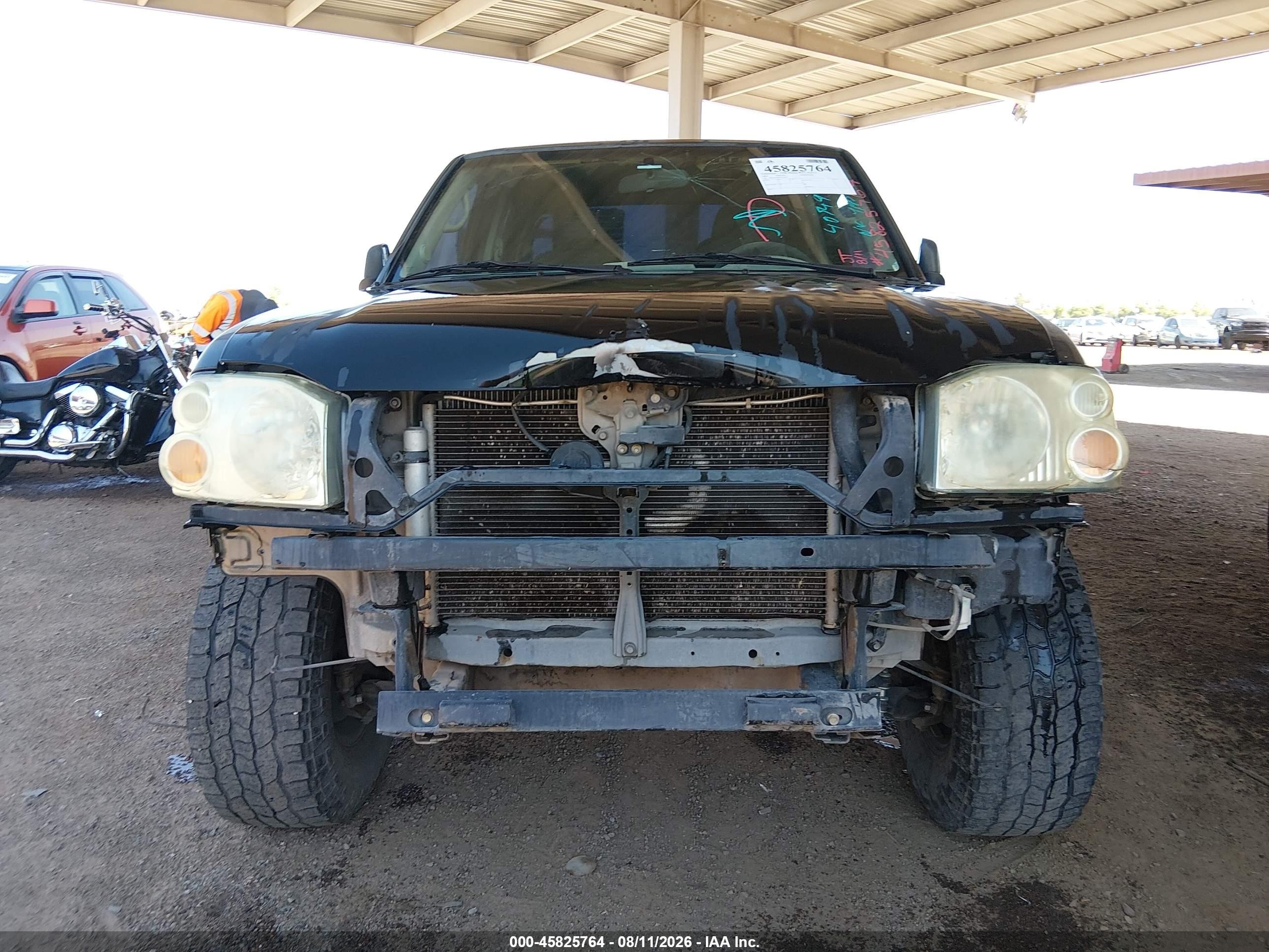 2004 Nissan Frontier Xe-v6 Black vin: 1N6ED29X64C410549