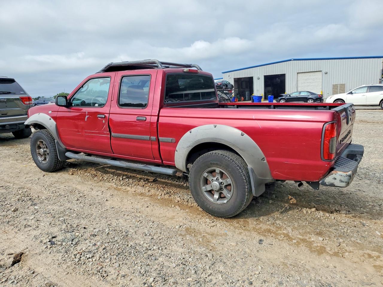 2002 Nissan Frontier Xe-v6 Red vin: 1N6ED29X92C321720