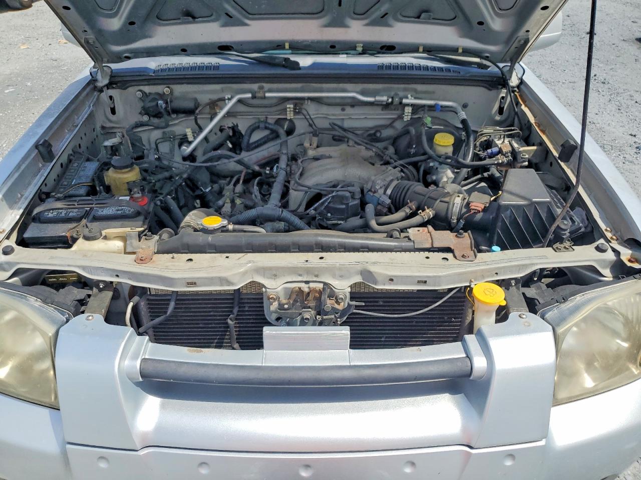 2002 Nissan Frontier Xe-v6 Серебряный vin: 1N6ED29X92C382873