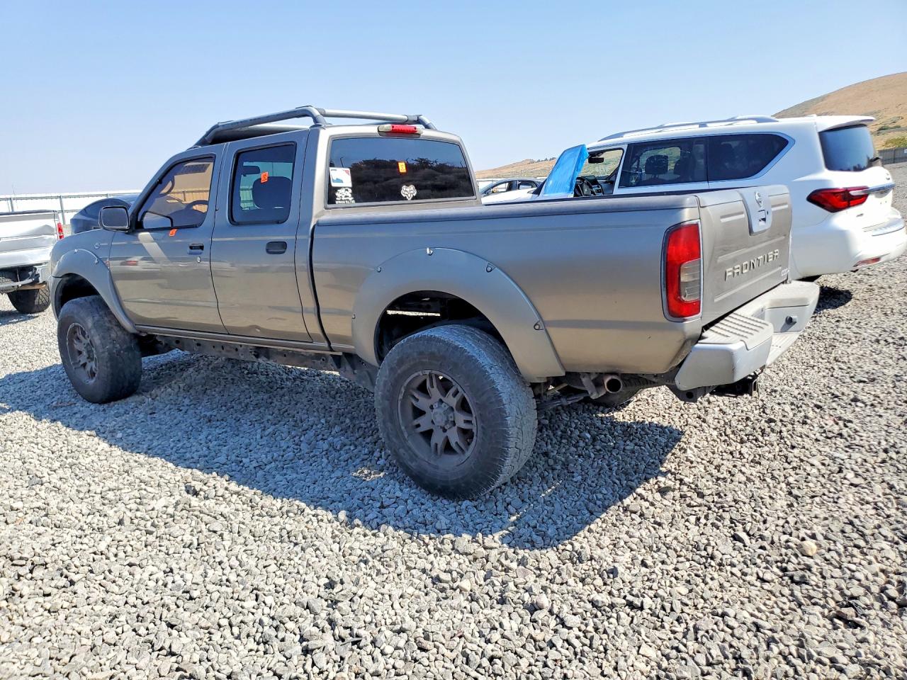 2003 Nissan Frontier Xe-v6 Tan vin: 1N6ED29X93C458934