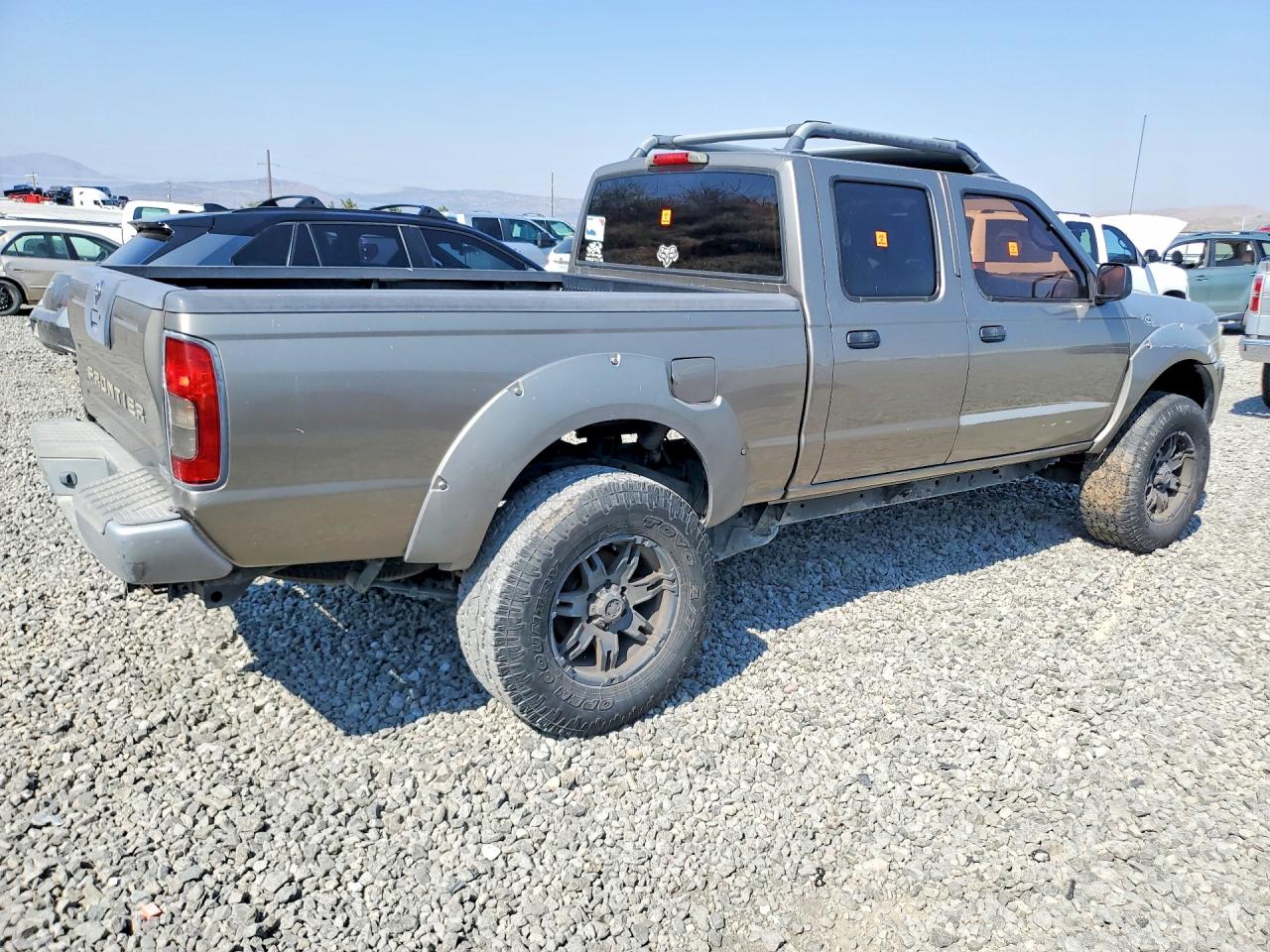 2003 Nissan Frontier Xe-v6 Tan vin: 1N6ED29X93C458934