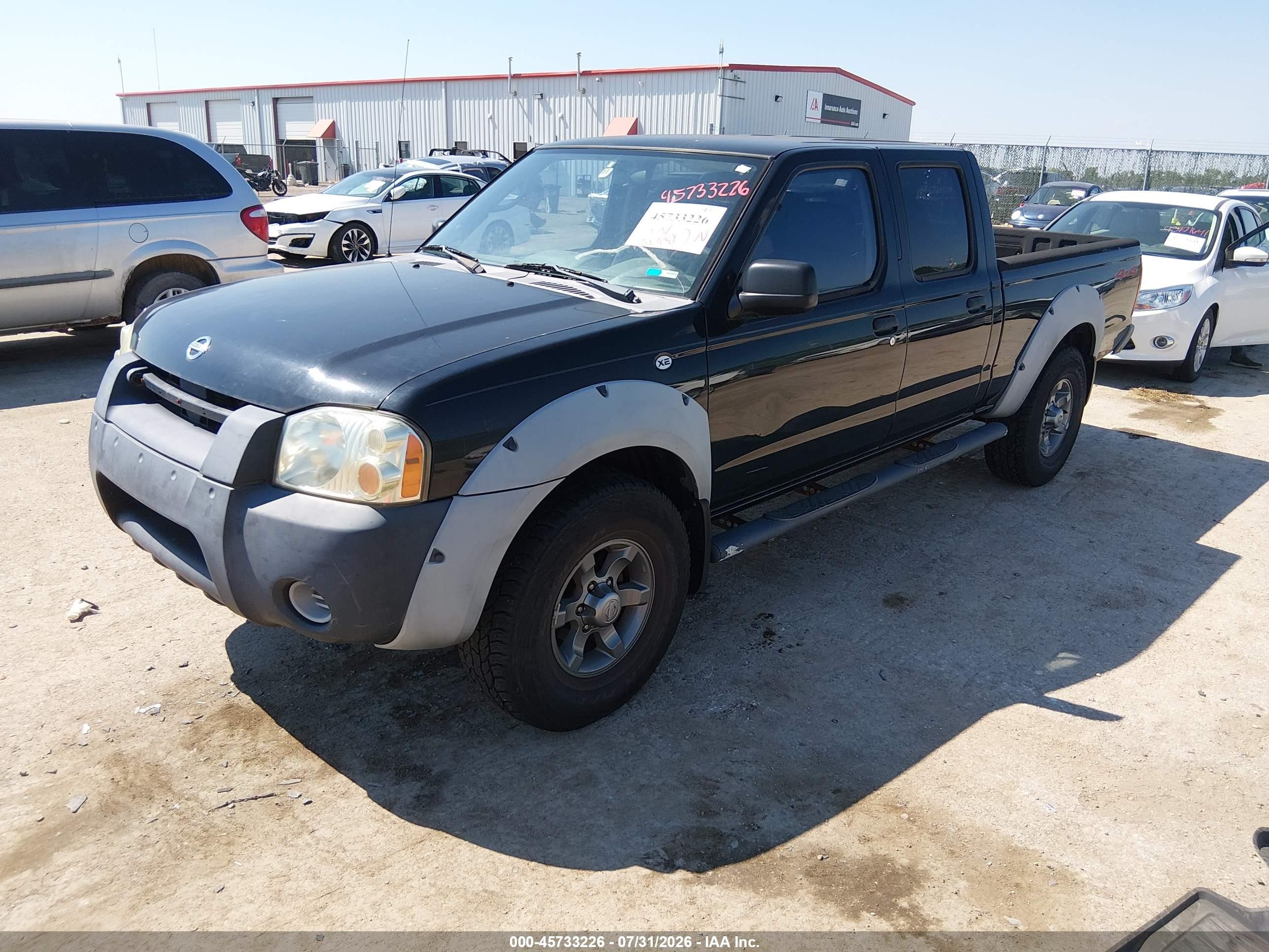 2002 Nissan Frontier Xe-v6 Black vin: 1N6ED29Y32C303299