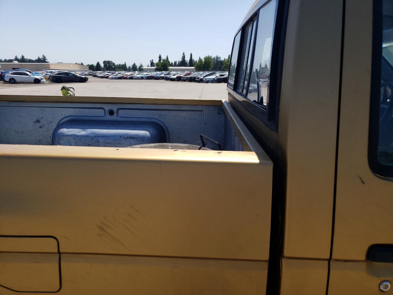 1990 Nissan D21 Short Bed Gold vin: 1N6SD11S6LC425144