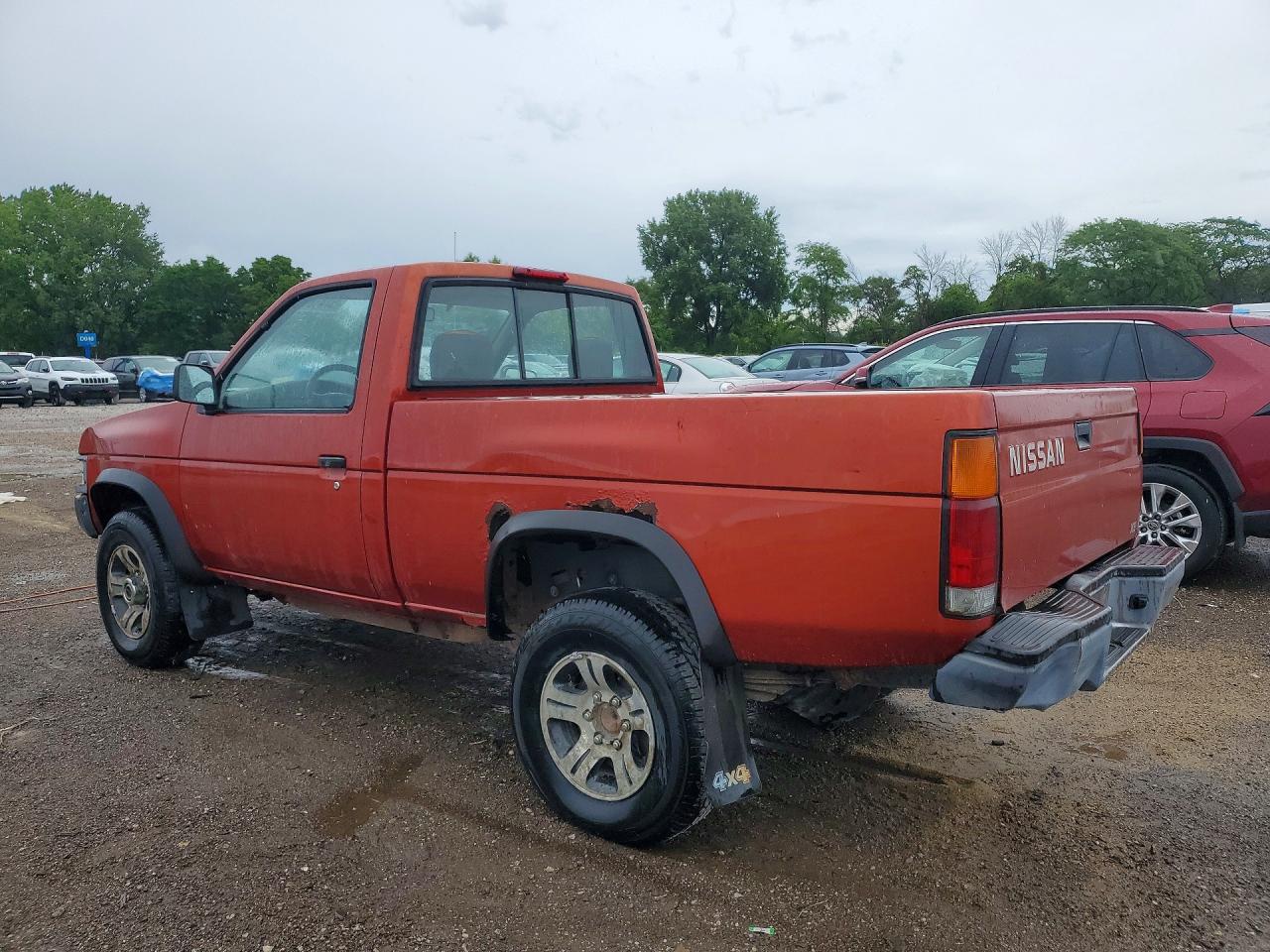 1997 Nissan Pickup Orange vin: 1N6SD11Y3VC351575